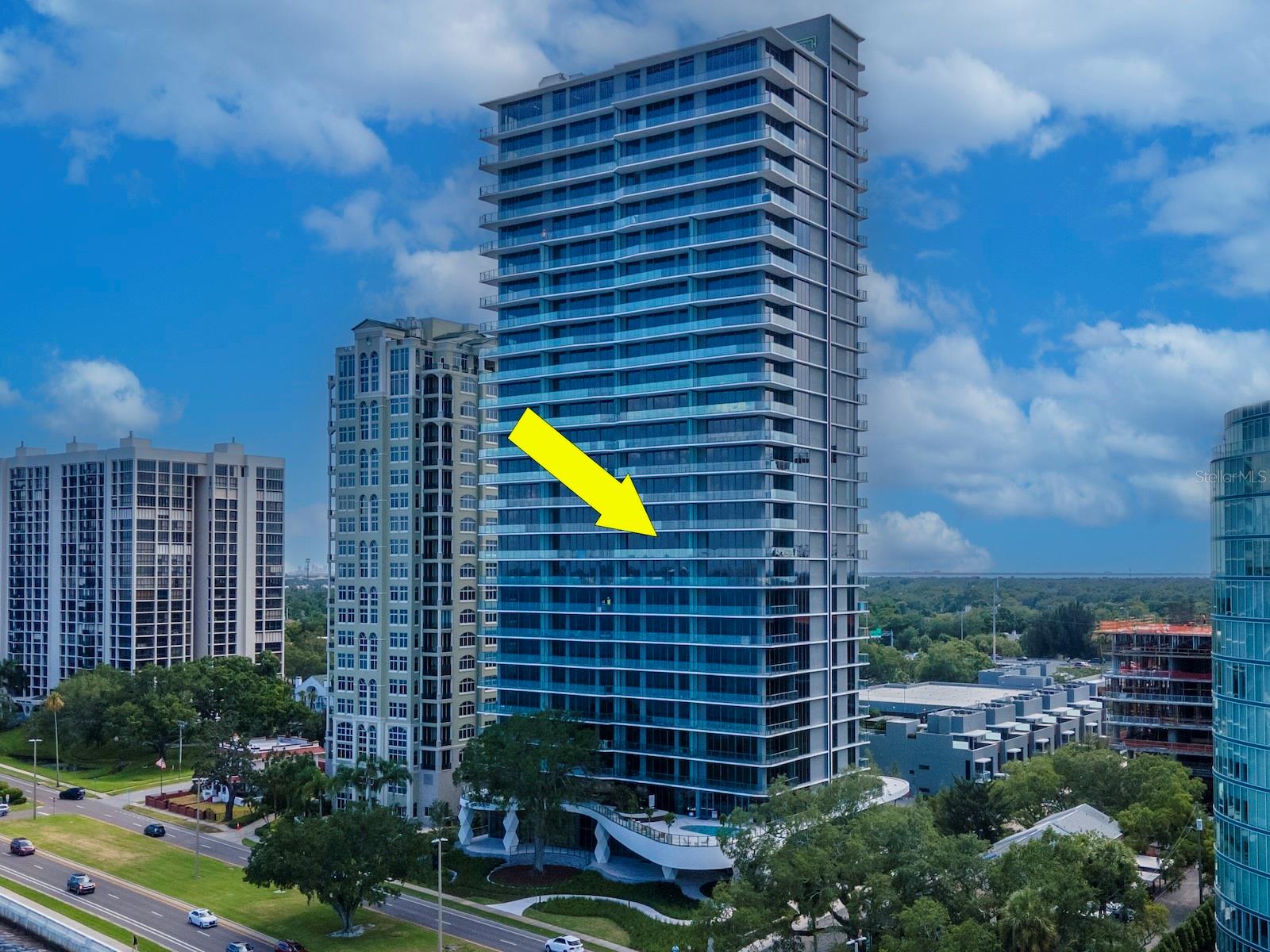 One or more photo(s) has been virtually staged. Ritz-Carlton Residences Tower 1. Stunning 2 bedroom, 2 bath, plus a den is located in the Ritz-Carlton Residences Tampa. Stationed on Tampa’s iconic Bayshore Boulevard, this residence really lives like a 3 bedroom with a “Jack and Jill” bathroom that connects the second bedroom with the den. The modern residence is beautifully appointed with a neutral color palate, high ceilings, custom Italian cabinetry, gorgeous marble countertops, waterfall island, spacious great room area with floor to ceiling windows and the best part…sliders that open to an oversized terrace presenting full Bay views. The floors throughout the residence are soft stone and extend out on to the terrace. In addition to all this unit has to offer you will be able to take advantage of all of the Ritz-Carlton amenities and services within the building including valet services, concierge services, daily continental breakfast, gym, pools, recreation courts and much more. Tampa’s newest luxury address is so much more than just a place to live, it’s a lifestyle that is curated by the renowned Ritz-Carlton standards of excellence and customer service. Custom built out closest and automatic blinds, 2 parking spaces and a storage space.