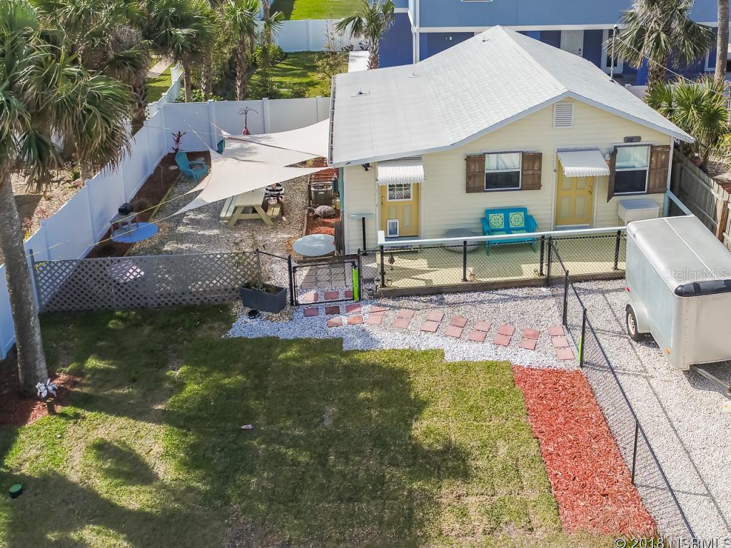 GREAT LOCATION, WONDERFUL DEVELOPMENT POTENTIAL!  This is an excellent opportunity to live at New Smyrna's beautiful beach, a block from historic Flagler Avenue. This area is the heart of beachside NSB, with its shops, dining, and nightlife. Bring plans for your dream beach house and build it here in this amazing location. You will have ocean views from the upper stories! The cottage has been recently renovated, is in excellent condition, and is sold furnished. Other development possibilities are possible as this parcel is situated within the short-term rental zoning area's bed and breakfast overlay zone. This special property is too good to pass up! ;Water: City