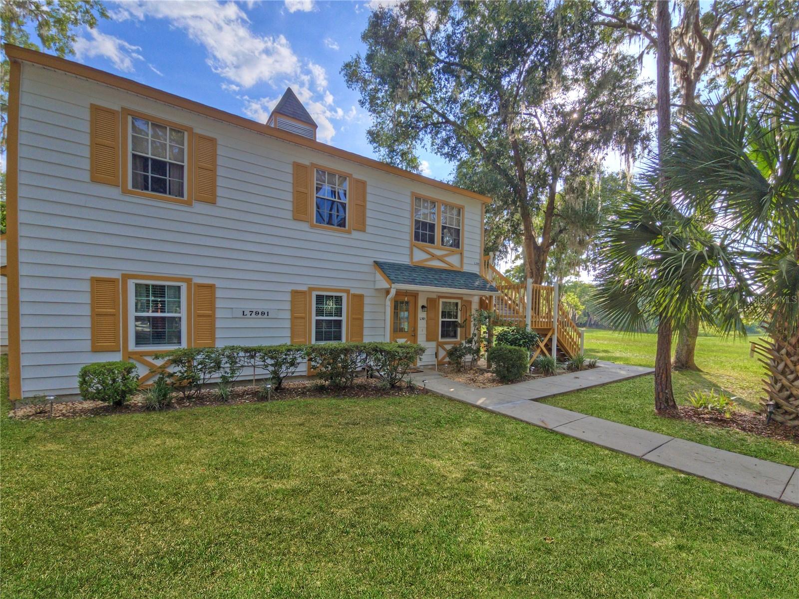 TURNKEY FURNISHED and ready for immediate enjoyment! This beautifully updated 2-bedroom, 2-bath condominium in the desirable 55+ community of Derby Downs offers carefree Florida living with scenic golf course and water views.

Inside, you'll find 840 square feet of thoughtfully designed living space plus an additional 140-square-foot screened lanai—the perfect place to enjoy your morning coffee, unwind with a good book, or take in peaceful sunsets overlooking the fairways and water. The recently renovated kitchen is a standout feature, boasting all-new appliances, granite countertops, a farmhouse-style sink, updated cabinetry, and modern finishes that make meal preparation both functional and enjoyable.  Both bathrooms feature new vanities, granite countertops and new fixtures as well.

Being sold completely furnished, this move-in-ready home allows you to start enjoying the Florida lifestyle from day one. The spacious primary suite and comfortable guest accommodations provide plenty of room for visiting family and friends.

Residents of Derby Downs enjoy low-maintenance living with HOA services that include exterior building maintenance, common area upkeep, garbage collection, pest control, and the peace of mind of roofs replaced in 2019-2020. An assigned parking space is conveniently located directly in front of the building.

Outdoor enthusiasts will appreciate the abundance of nearby recreational opportunities, including Silver Springs State Park, the Silver River, Lake Weir, Little Lake Weir, and multiple golf courses such as Silver Springs Shores Golf & Country Club and Lake Diamond Golf Club. Shopping, dining, medical facilities, and everyday conveniences are also just minutes away.

Whether you're looking for a full-time residence, seasonal retreat, or low-maintenance Florida getaway, this furnished condo offers exceptional value, beautiful views, and an active lifestyle in one of Ocala's most convenient locations. Schedule your private showing today and discover why Derby Downs is such a popular destination for active adults!