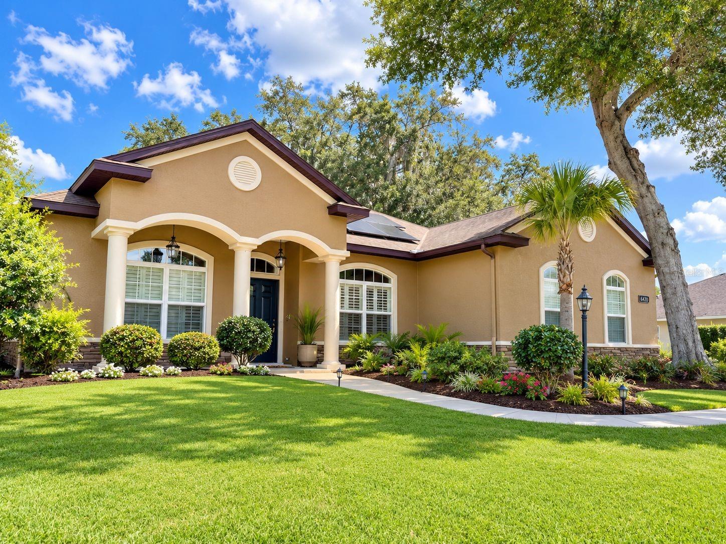 Virtually Staged. Welcome to this beautiful 4-bedroom, 3-bath pool home located in the highly desirable gated community of Magnolia Grove in Southeast Ocala! Situated on a spacious half-acre lot, this stunning residence offers over 2,200 square feet of living space with an ideal split-bedroom floor plan designed for both comfort and functionality.

Enjoy Florida living at its finest with a private screened-in pool, expansive covered lanai, and fully fenced backyard—perfect for entertaining, pets, and family gatherings. Mature shade trees provide a picturesque setting and added privacy, creating your own backyard retreat.

Inside, you'll find soaring ceilings, an open-concept layout, a spacious kitchen with abundant cabinetry, granite countertops, breakfast bar, and a cozy dining area overlooking the pool. The generous primary suite features a walk-in closet and an en-suite bath designed for relaxation.

Adding even more value, this home is equipped with solar panels, helping to reduce energy costs and increase efficiency while providing long-term savings.

Located in a sought-after gated neighborhood with low HOA fees, this home is zoned for the highly rated Forest High School and Osceola Middle School districts. Magnolia Grove is a wonderful family-friendly neighborhood surrounded by beautiful newer homes and conveniently located near shopping, dining, medical facilities, parks, and major roadways.

Don't miss this incredible opportunity to own a private pool home in one of Southeast Ocala's most desirable communities. Schedule your private showing today and experience everything this exceptional home has to offer!