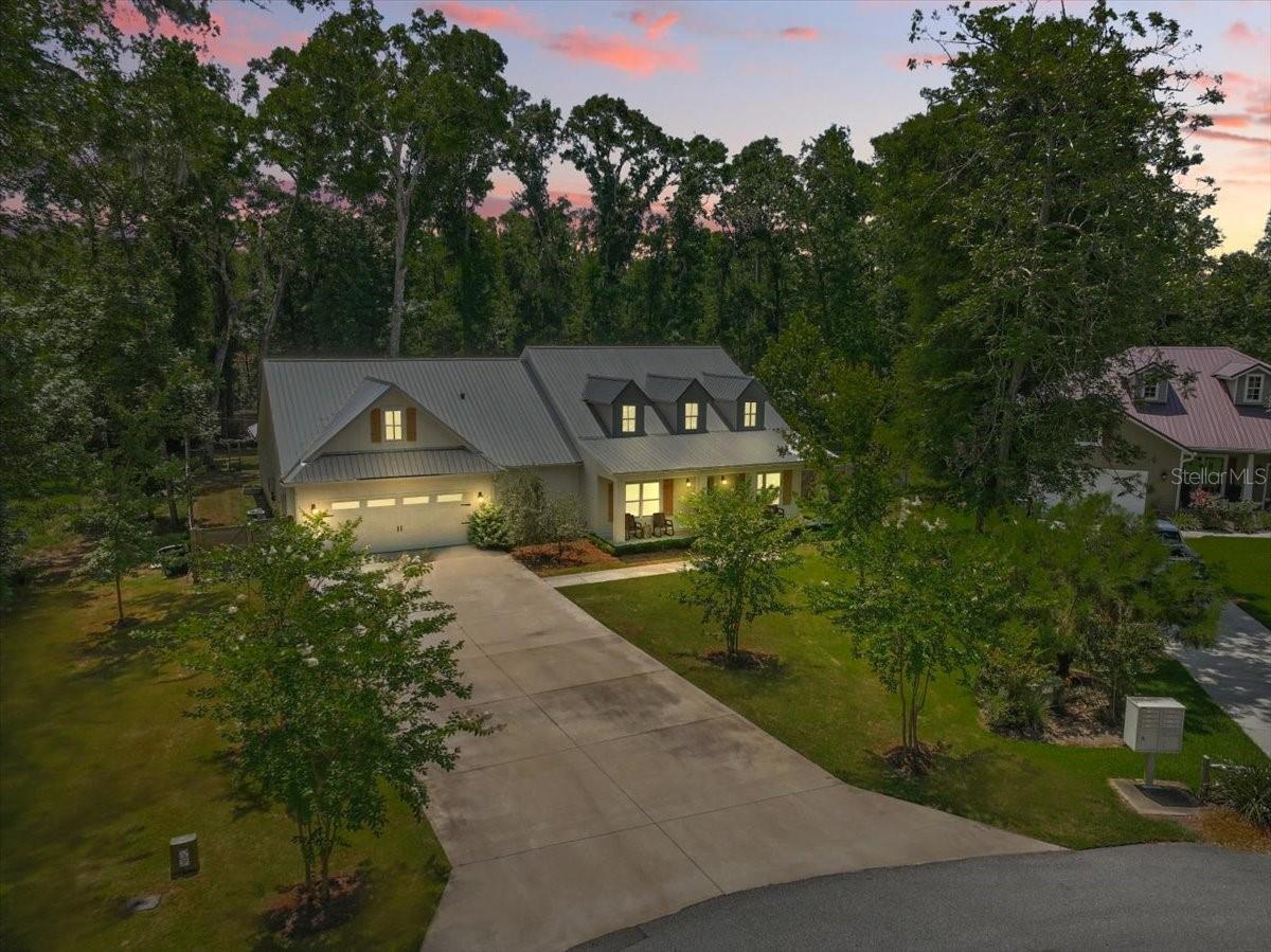 Pull into the drive and immediately notice the difference. This 2022-built residence offers the
finishes buyers want, the square footage they need, and neighborhood amenities that strengthen
everyday living. Located inside a gated community in Fanning Springs, this 4-bedroom, 3.5-bath
home with an office spans 3,027 square feet on a manageable .65-acre lot.
Inside, the main living area feels open and inviting with vaulted ceilings, decorative lighting,
crown molding, built-ins, and gas fireplace centerpiece. The layout creates strong flow between
kitchen, dining, living, and outdoor spaces.
The kitchen was designed for buyers who actually use their kitchen daily. Ample prep space,
cabinetry, and entertaining flow make it one of the most marketable rooms in the home.
The owner’s retreat includes dual closets, split vanities, private water closet, and upgraded
shower features. There's also a show stopping bathtub that calls to you. Additional bedrooms offer flexibility for family, guests, or home office use. 
The fenced backyard and covered patio provide private outdoor enjoyment with less upkeep than
oversized acreage properties.
Community amenities include neighborhood pool, tennis courts, pickleball, basketball, and
fitness center access—an excellent value advantage without personal maintenance responsibility.
Fanning Springs remains popular for buyers seeking springs access, Suwannee River recreation,
scenic beauty, and a more relaxed pace of life while staying near essential services.
The adjacent lot is also available for buyers wanting extra room or future options.
For buyers comparing resale choices, this home stands out for age, presentation, amenities, and
move-in-ready condition.