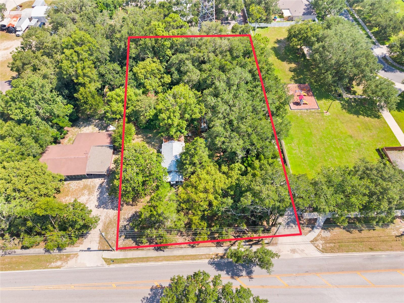 Opportunity awaits on this property in fast-growing Apopka! Situated on a generous 0.61-acre agriculturally zoned lot. Whether you're looking for a place to build dream home with room to grow, or as an investment property this unique property offers endless possibilities in a rapidly developing area.  With no HOA, you'll have the freedom to park your boat, RV, or other recreational vehicles on-site. Close to schools, parks, shopping and restaurants. Well, septic and electric on site. There are two buildings on the lot.