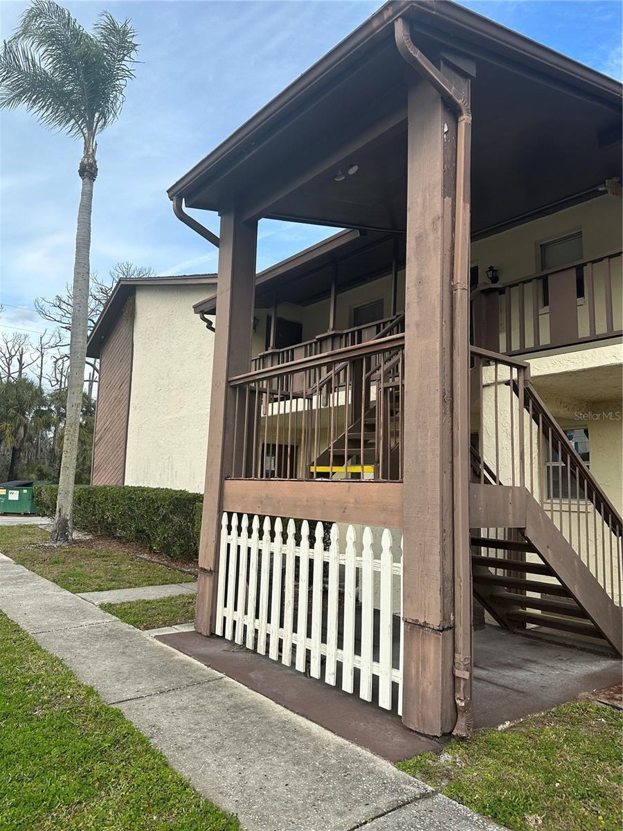 This well-maintained 2-bedroom, 1-bath second-floor unit is currently rented for $1,070 per month with a lease in place through February 28, 2027, making it an excellent investment opportunity. The home features tile flooring in the kitchen, black appliances, laminate wood flooring in the living room, and comfortable carpeting in both bedrooms. Enjoy the elevated second-story location with a private patio, perfect for relaxing with evening tea. Community amenities include an on-site laundry facility and a refreshing swimming pool. Conveniently located near local parks, Walmart Supercenter, and the newly renovated Gulf View Square Mall, this property offers easy access to shopping, dining, and everyday conveniences. Whether you're looking to add to your investment portfolio or secure a future home, this affordable property offers great value in a convenient location.