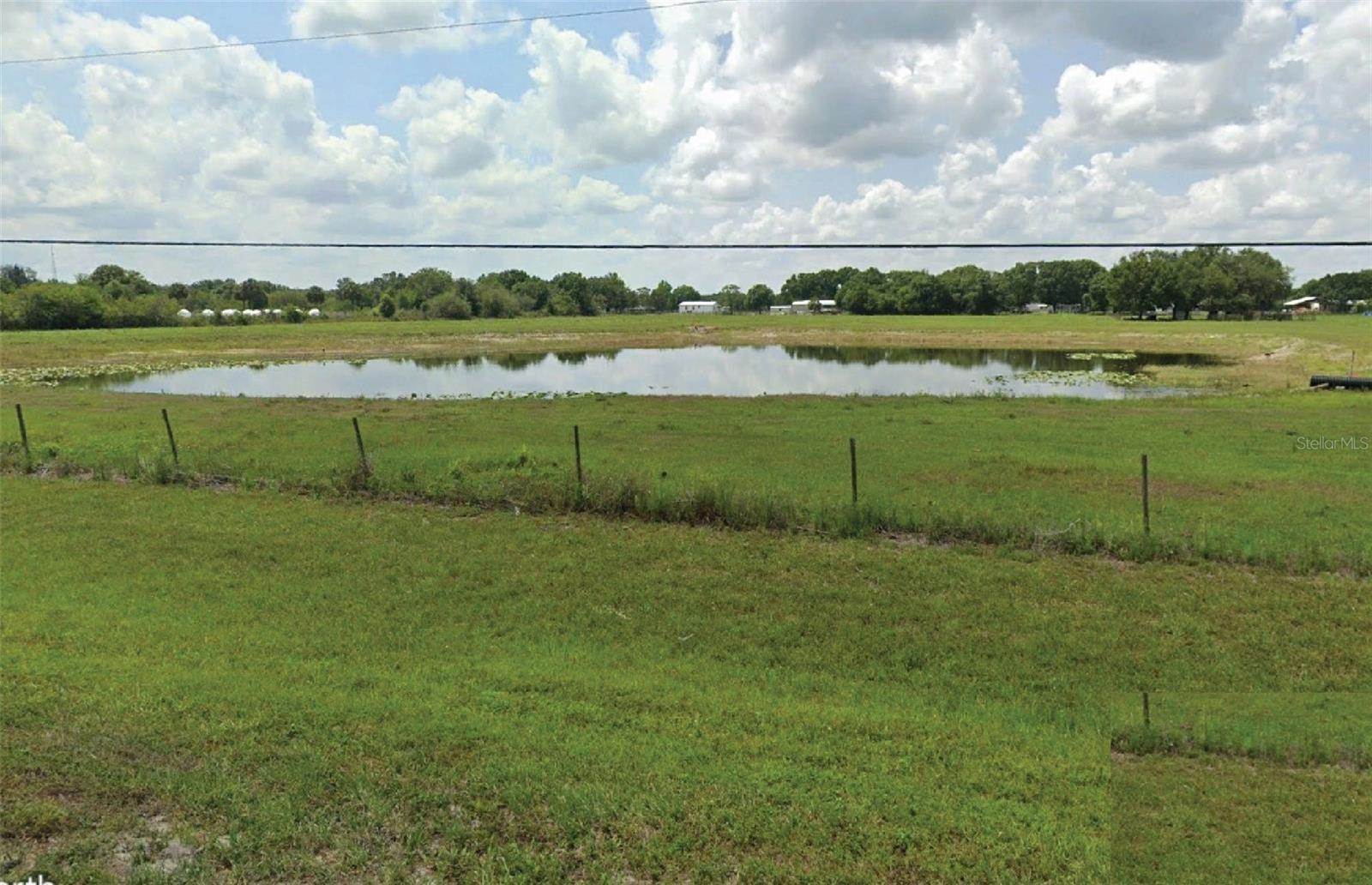 Perfect opportunity to build your dream home! This 17-acre property offers a rare combination of
size, access, and natural beauty in Kenansville, Osceola County. The site comprises two parcels,
with a beautiful 2-acre pond in the northern portion of the property. Whether you’re envisioning a
private estate or a small residential development. This property offers tremendous flexibility and
upside. Positioned directly on S. Canoe Creek Road, this property offers great accessibility. The peaceful
rural lifestyle feel is complemented by the convenience of nearby Osceola County amenities, with St.
Cloud and the growing corridor along US-192 just a short drive away. Do not miss the opportunity to own this gorgeous property in one of Central Florida’s most quietly sought-after rural communities. Call for a showing today!