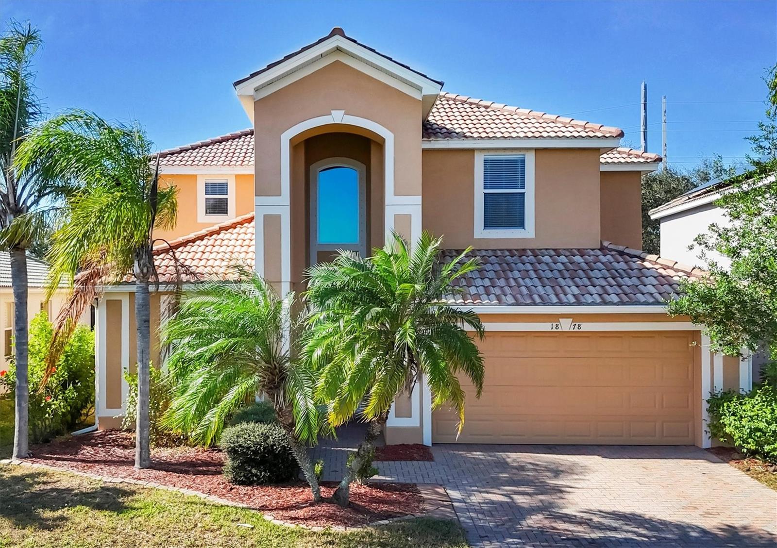 From the moment you enter Stoneybrook at Venice, you’ll feel right at home. This sought-after, master-planned community offers an exceptional lifestyle for both families and those enjoying retirement. Spanning over 500 acres, Stoneybrook features scenic sidewalks, abundant green space, and plentiful wildlife, making it ideal for outdoor enthusiasts.
Conveniently located just south of Interstate 75, the community provides quick access to everything Southwest Florida has being approximately 20 minutes to Venice Beach, 30 minutes to Sarasota shopping and dining, and just minutes from historic downtown Venice.
This Mediterranean Revival home welcomes you with a grand, soaring entry and a spacious, well-designed layout perfect for everyday living and entertaining. Relax by the pool while enjoying tranquil pond views, creating the perfect Florida retreat.
The home offers a flexible floor plan with one bedroom and full bathroom on the main level, ideal for guests or multigenerational living. Upstairs, you’ll find four additional bedrooms, two full bathrooms, and a generously sized den, providing ample space for family, work, or play.
Bring your family and experience the lifestyle, amenities, and natural beauty in Stoneybrook at Venice and Southwest Florida.