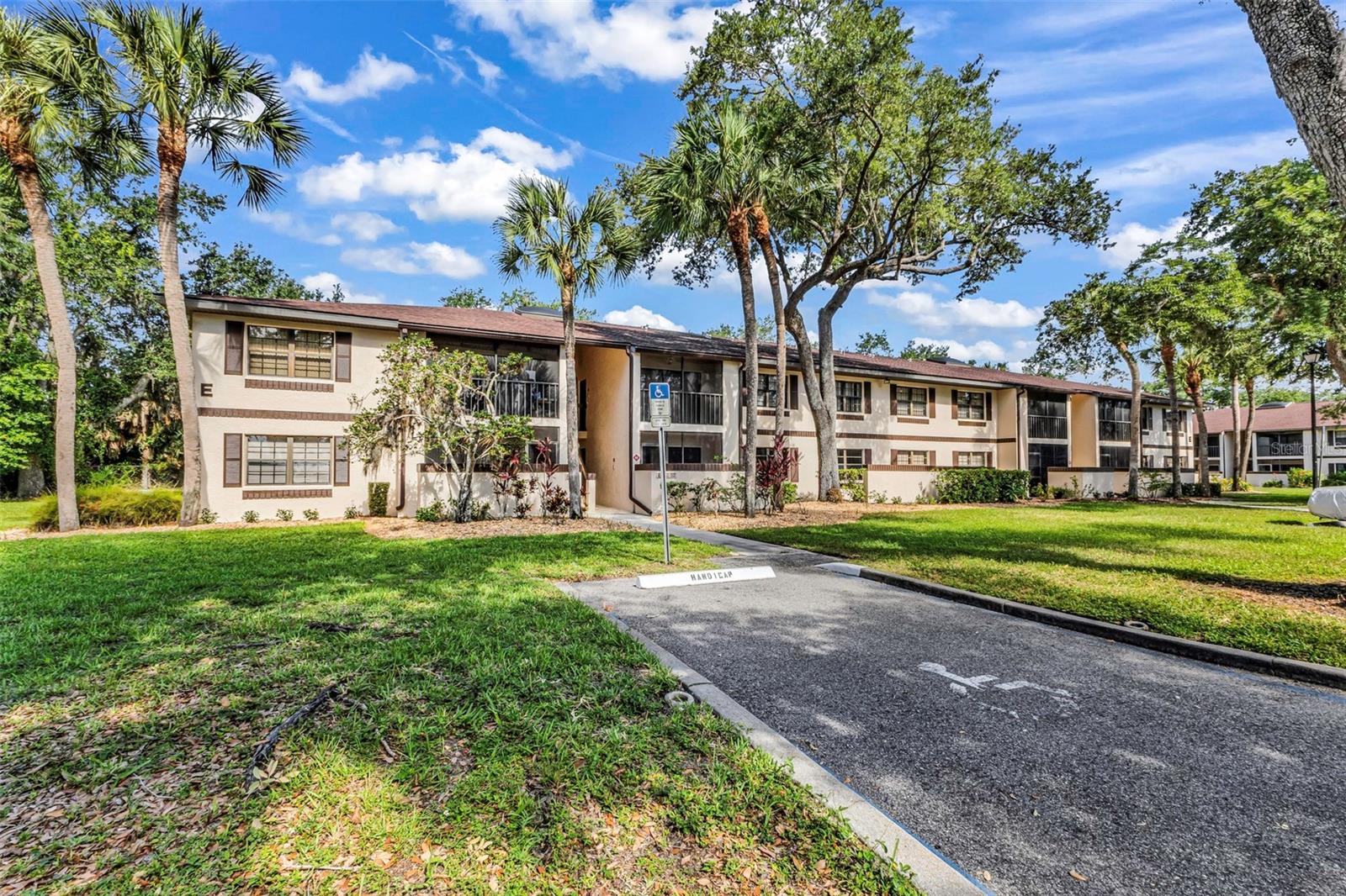 Welcome to The Oaks III! This updated first-floor 2-bedroom, 2-bath condominium offers comfortable and convenient living in the heart of Port Charlotte. Recent improvements include fresh interior paint and new tile flooring, giving the home a clean, modern feel.

The functional floor plan provides a spacious living area, comfortable bedrooms, and an enclosed lanai that adds additional living space to enjoy year-round. Located just steps from the community amenities, residents can enjoy the pool, shuffleboard courts, bocce ball, recreation facilities, and numerous social activities.

Conveniently situated near shopping, dining, medical facilities, parks, and everything