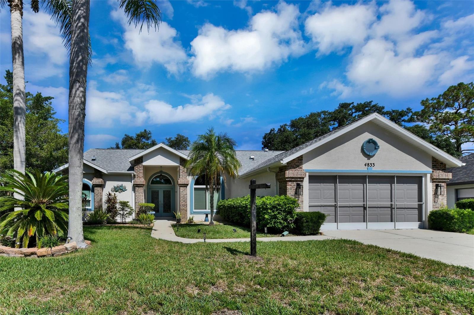 Move-In Ready Pool Home with Over $100,000 in Recent Upgrades!
Welcome home to this beautifully updated 3-bedroom, 2-bathroom residence, tucked away on a quiet street while remaining just minutes from shopping, dining, parks, and everyday conveniences.
With more than $100,000 in renovations completed within the last eight months, this home is truly turnkey and ready for its new owners.
The stunning chef's kitchen has been completely renovated and features beautiful quartz countertops, all-new premium appliances, including a professional-grade induction double oven range, upgraded microwave with air fryer, dishwasher, and abundant workspace for cooking and entertaining. Matching quartz countertops continue from the kitchen into both bathrooms, while the entire interior has been freshly painted. The spacious primary suite includes a beautifully updated bathroom with a brand-new walk-in shower. A new washing machine is also included in the generous laundry room.
Enjoy peace of mind knowing all the major updates have already been completed, including:
New roof (2021)
New air conditioning system (2021)
High-impact windows (2023)
Water heater (2020)
Water softener (2021)
Step outside to your own private backyard retreat. The sparkling saltwater pool has been resurfaced with a beautiful Pebble Tec finish and features solar heating for year-round enjoyment.  Screened lanai, complete with sunshades, new screen enclosure netting, a freshly painted pool cage, and professionally landscaped grounds.
The desirable split-bedroom floor plan offers both privacy and functionality. The spacious kitchen flows seamlessly into the breakfast nook and family room, where a cozy wood-burning fireplace creates the perfect gathering space for family and friends.
Additional upgrades include a whole-house generator plug, new sprinkler system (2022), upgraded pool equipment with lighting , refinished patio, enhanced outdoor lighting, and a screened garage door (2020) that allows fresh air to circulate on warm Florida days
The seller is relocating north for business and is highly motivated. This exceptional home is priced to sell and offers incredible value with its extensive upgrades and meticulous care. Easy showing.