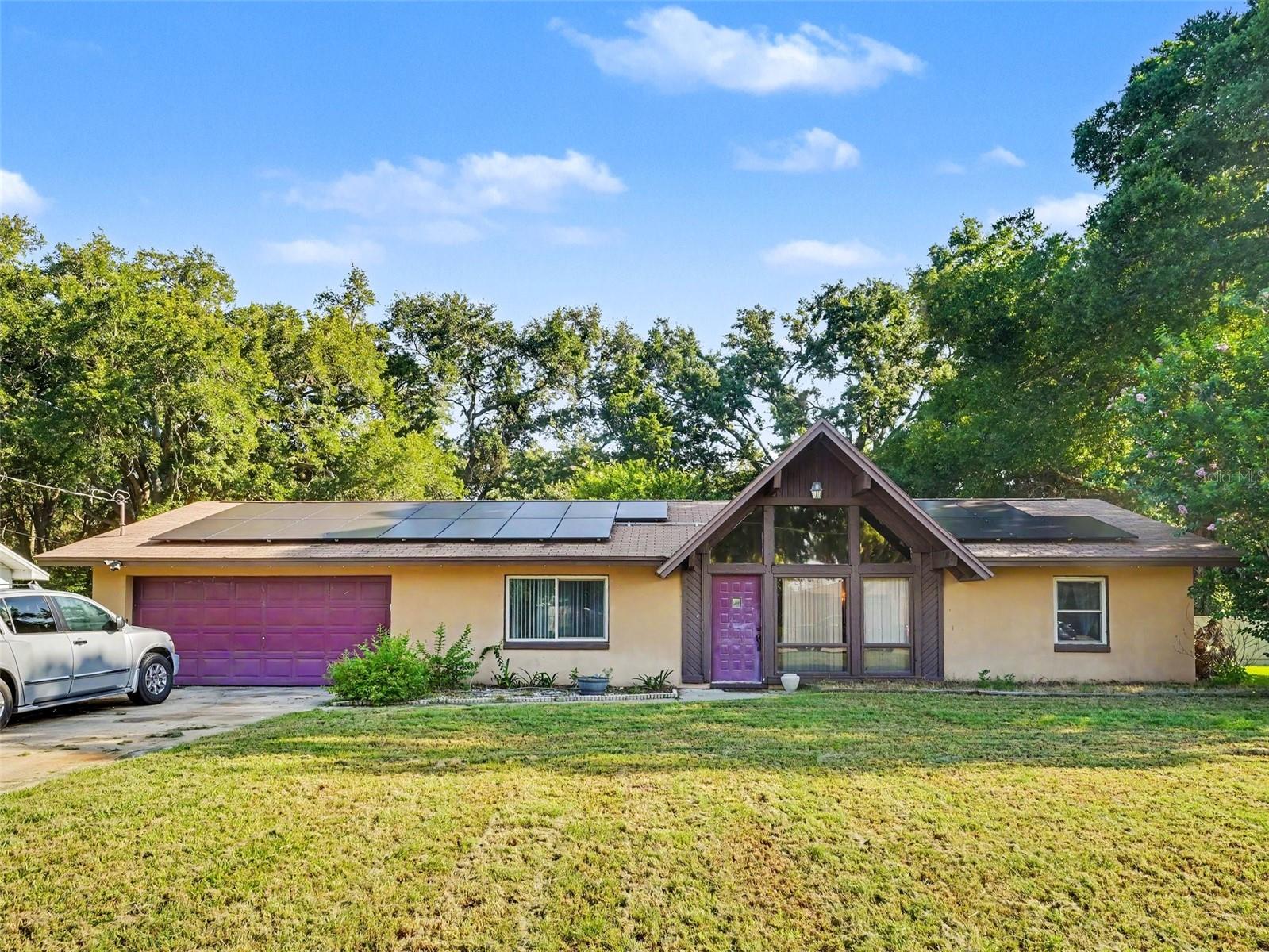 Welcome to this inviting home in the heart of Auburndale, offering comfort, space, and plenty of room to make lasting memories. The spacious living room features a cozy fireplace, creating the perfect setting for relaxing evenings or entertaining guests. Step outside to enjoy the large, privately fenced backyard complete with a covered back porch—an ideal space for family gatherings, weekend barbecues, or simply unwinding outdoors. A recently installed HVAC system provides added peace of mind and year-round comfort. Conveniently located near shopping, dining, schools, and major roadways, this home offers a wonderful opportunity to enjoy all that Auburndale has to offer. Schedule your private showing today!