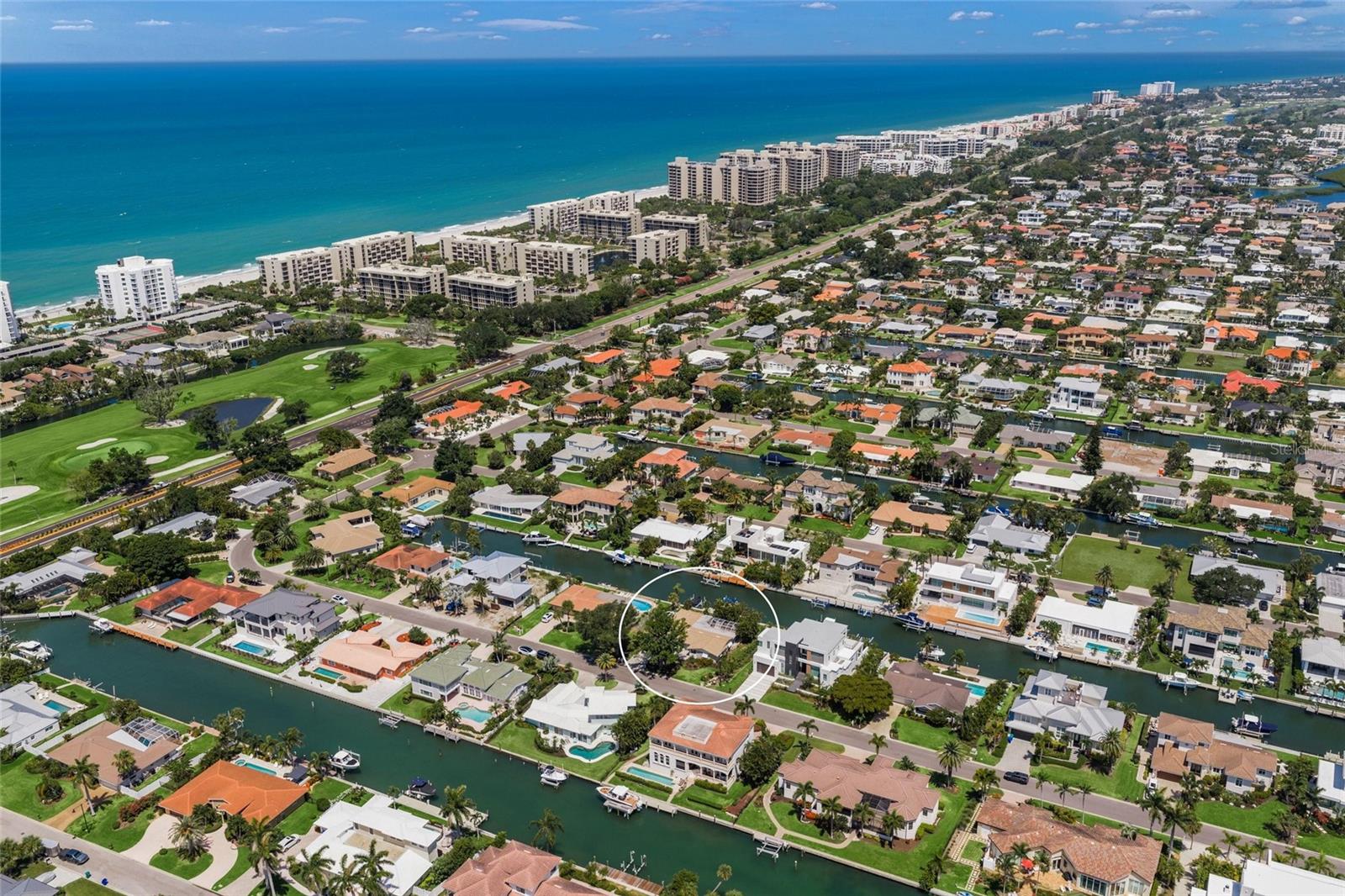This is the one * PERFECTLY POSITIONED ON A QUIET CUL DE SAC STREET AT THE PREFERRED SOUTH END OF LONGBOAT KEY * Located on the QUIET END OF THE CANAL with OPEN WATER JUST BEYOND YOUR DOCK and the PRIVATE BEACH ACCESS ONLY MINUTES AWAY * A quick 3 minute cruise to Sarasota Bay & the ICW & The GULF * This coveted Country Club Shores IV home has been LOVINGLY RENOVATED with a NEW Kitchen & modern amenities while retaining its classic charm * NEW KITCHEN CABINETS * NATURAL GAS STOVE * GE CAFE APPLIANCES * NEW Solid Core Doors * FULL HURRICANE PROTECTION * NEW TILE Flooring throughout * 2 Car Garage has a NEW Mini Split A/C * Primary Suite with a Spa-style Bath featuring a LARGE Walk-in Shower * BEAUTIFUL VIEWS OF YOUR POOL & PRIVATE CANAL * This THOUGHTFULLY CURATED HOME is an open floor plan * The additional Bedrooms are well-appointed and located in a way that allows for guest privacy * Impact Sliding Glass Doors surround the Outdoor Area * All of this wraps your Caged Pool with Paver Decking and a Paver Walkway to your 2021 NEW SEAWALL & COMPOSITE DOCK with a 10,000lb Boat Lift & 2 Additional NEW Jetski Lifts PLUS a 2-step down Kayak Dock Launch with Power & Water * THIS IS A BOATER'S DREAM * The PERFECT HOME & OUTDOOR OASIS to entertain family & friends or just simply relaxing in your slice of paradise * PRIDE OF OWNERSHIP SHOWS IN THIS IMMACULATE HOME * Furniture is available * Just bring your suitcase * Country Club Shores is a well established waterfront neighborhood offering DEEDED BEACH ACCESS with a convenient south end location close to ST ARMAND'S CIRCLE, The new ST REGIS, and even downtown Sarasota * Join the Longboat Key Club offering 45 holes of championship golf & world class tennis * Your family will love this home * One look & you'll fall in love! *
