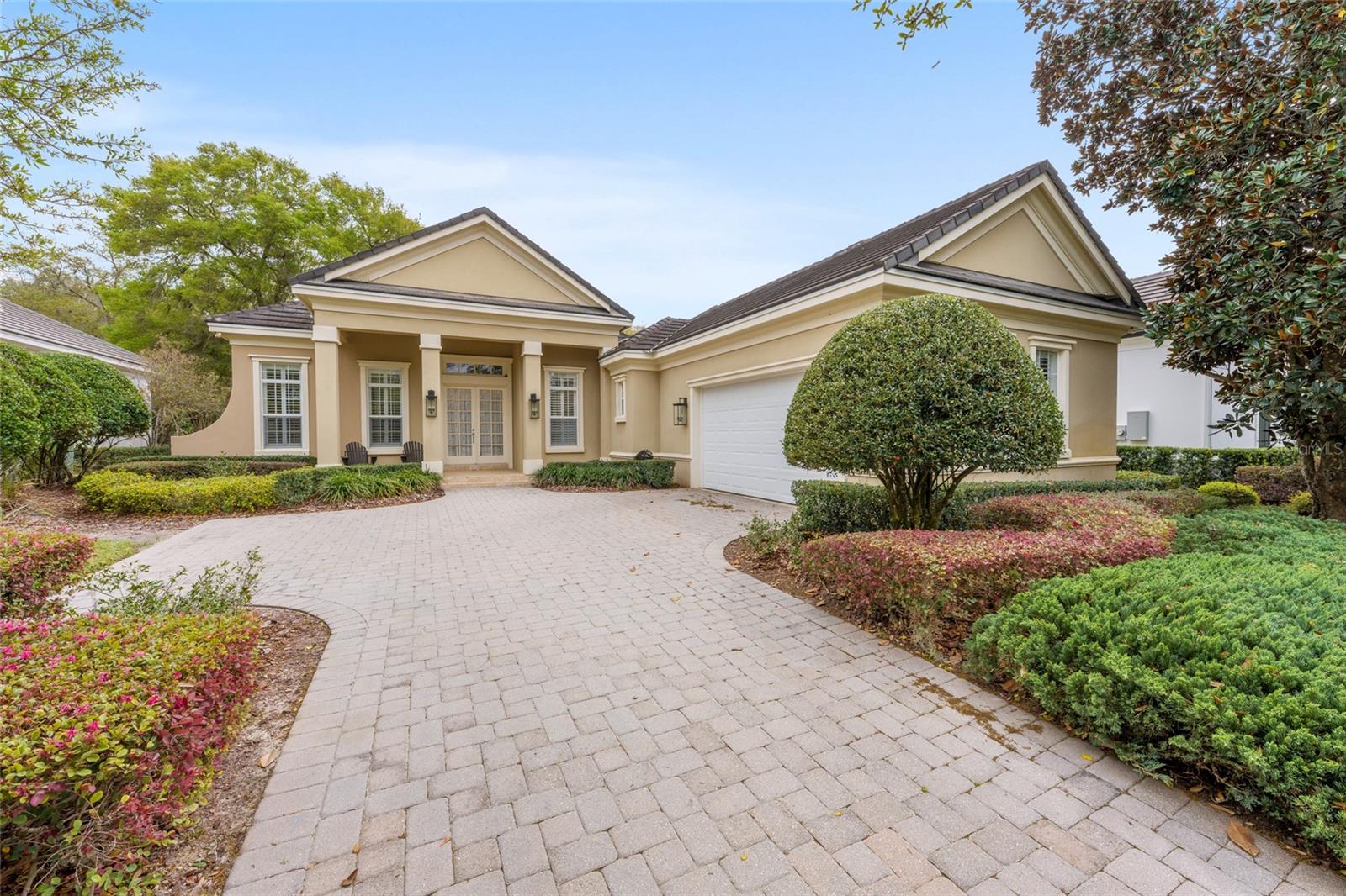 Welcome to Golden Ocala Golf & Equestrian Club, where turnkey luxury meets an exceptional location just moments from the World Equestrian Center. This beautifully maintained and fully furnished 3 bedroom, 3 bath residence offers immediate move-in readiness with furnishings, decor, and household items included.

Recently enhanced, the home features a freshly painted interior, painted cabinetry throughout, and updated bedrooms with luxury vinyl plank flooring, combining durability with a refined aesthetic. The open-concept layout is complemented by soaring ceilings, crown molding, and abundant natural light, creating an inviting yet tastefully updated living space. The kitchen is well-appointed with granite countertops and ample cabinetry, seamlessly flowing into the living and dining areas for effortless entertaining. The third bedroom is currently staged as an office but functions fully as a bedroom, offering flexibility for guests or additional living space.

Step outside to a private outdoor retreat designed for year-round enjoyment. The screened saltwater pool and spa have been recently resurfaced, accompanied by a new pool heater and updated pool equipment, ensuring a modern and efficient system. The expansive lanai and covered outdoor living area with summer kitchen overlook a beautifully landscaped and fully fenced backyard, offering both privacy and tranquility.

Additional recent improvements include a new AC unit, providing comfort and peace of mind.
Ideally located within close proximity to the spa, tennis, and fitness center, and just a short golf cart ride to WEC, this home offers both convenience and lifestyle. With excellent income potential, it presents a compelling opportunity as a primary residence, seasonal retreat, or investment property in one of Ocala’s most sought-after communities.