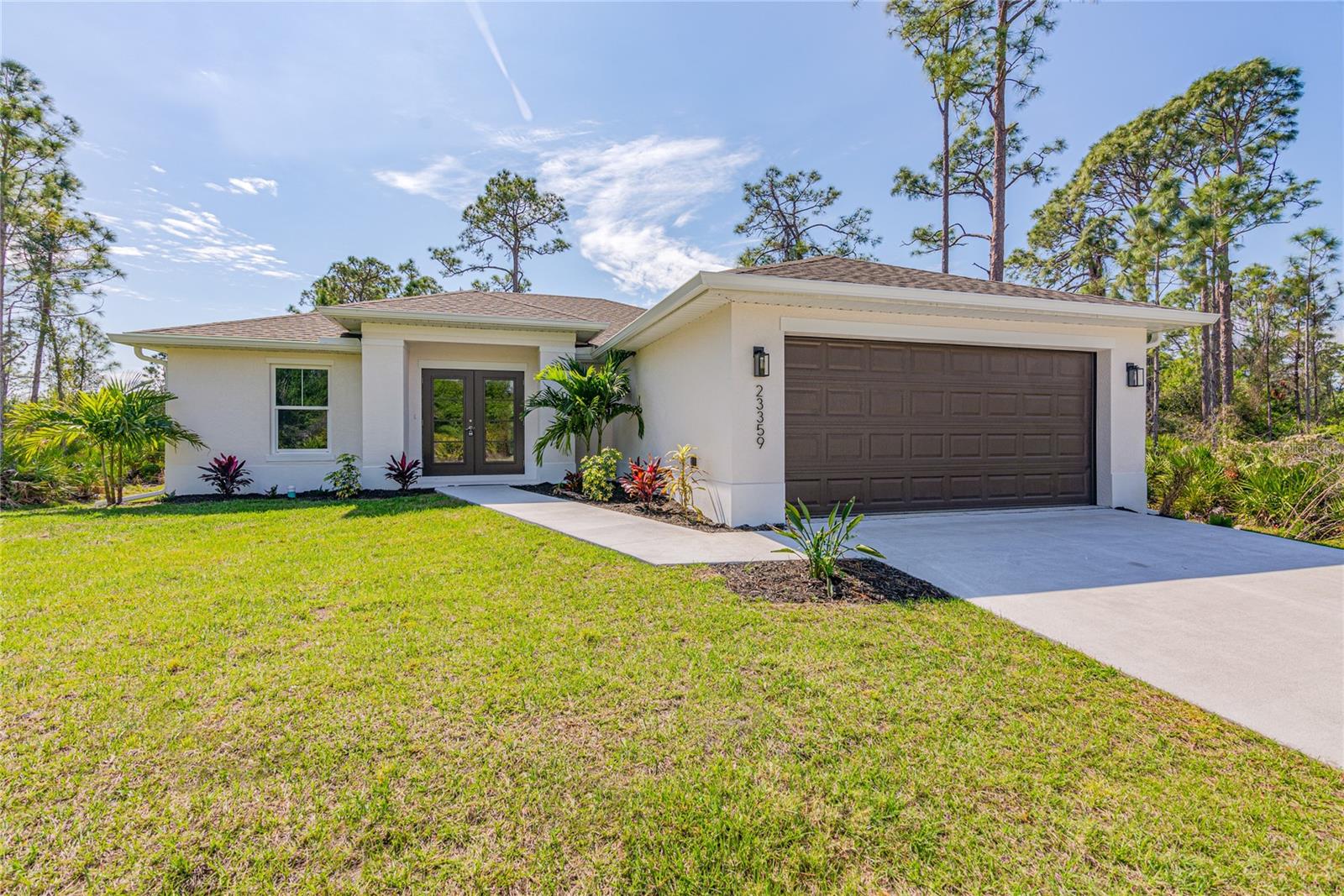 New Construction, This beautifully appointed home features 1556 sq feet of living area with four bedrooms and two full bathrooms. Kitchen features granite counters with a four inch backsplash, stainless appliances and shaker style cabinets. Home features wide colonial style baseboards and luxurious LVP flooring throughout, exterior features include hurricane impact windows, concrete driveway, bahia sod and a front yard landscape package. Great starter home for the young family or ideal for a retiring family.  *Photos of similar Banyan Model that was recently completed*