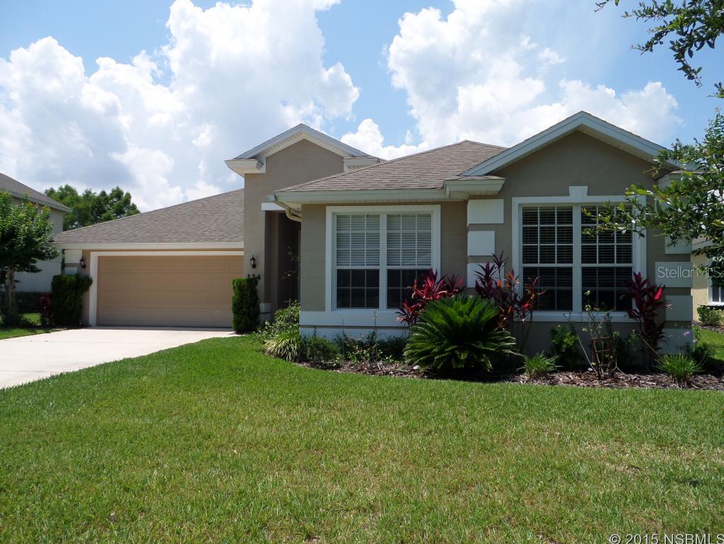 Bright, clean and move in ready, this spacious home sits on a premium golf course and water view lot. The seller has installed new GE Stainless appliances, designer hardware and a custom tile back splash in the kitchen to accent the oak cabinetry. An open floor plan with a large living room, formal dining room area, open kitchen with a peninsula and dining nook that overlooks the large yard. Enjoy a split floor plan for just enough separation from your guests. The master has a slider to the screened and tiled lanai, his and hers walk in closets, an upgraded bathroom with a soaking tub, walk in shower and double gentleman's height vanities. The guest wing features an office/den that could easily be converted to a fourth bedroom, if needed, and 2 large guest bedrooms and a full bathroom. The utility room is off the 2 car garage and near the master bedroom for added convenience. Lawn care and sprinkler maintenance is included with your quarterly HOA fee, so the entire neighborhood looks well maintained. This home is extra special with an upgraded tropical landscape. Rain gutters installed in the front and rear of home. ;Water: City