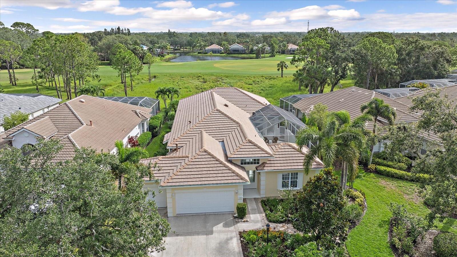 With over $400k in bespoke upgrades, a private guest casita, and a resort-style therapy pool overlooking the golf course, this meticulously redesigned estate isn't just a home—it’s a lifestyle best experienced firsthand

Breathtaking in both design and setting, this extensively reimagined Neal Homes golf course front and preserve front residence in University Park Golf & Country Club offers a rare blend of privacy, luxury, and lifestyle within one of Sarasota’s most sought-after gated communities. Positioned on a quiet cul-de-sac within the acclaimed University Park Golf and Country Club, in maintenance free Ascot Village, this customized Lismore floor plan spans 2,421 square feet under air and showcases a courtyard-style layout centered around a resort-style therapy pool. Expansive preserve and golf course views overlook the 20th hole, while the Northeast-facing rear exposure captures peaceful morning sunrises.

FLOORPLAN OVERVIEW:  4 ensuite bedrooms (3 in the main house and 1 in the casita) | 4.5 bathrooms | 2 car garage and 1 golf cart garage | 2,421 sf | 694 sf of screened in areas.  

Thoughtful modernization and high-end finishes are evident throughout. White oak engineered wood flooring runs through the main living areas, complemented by recessed lighting and full pocketing sliders opening to the lanai. In the kitchen, white shaker cabinetry, quartz countertops and backsplash, and a Samsung “White Ice” appliance suite with induction cooktop create a clean, functional space. An electric heated fireplace anchors the living room, framed by tranquil outdoor views. In the primary suite, plantation shutters, a custom walk-in closet, and an updated bath with quartz counters and a spacious walk-in shower create a private retreat. Three additional bedrooms, including a detached casita with its own courtyard access, offer flexibility for guests, multigenerational living, or a dedicated office. 

Outdoor living is equally compelling, featuring a reconfigured courtyard pool with natural gas heating and an oxygen purification system, along with multiple entertaining areas including a screened lanai and rear patio overlooking the preserve and golf course. A summer kitchen under air further enhances the home’s entertaining appeal.

More than $400,000 in upgrades since 2023 elevates this property well beyond typical offerings. Major improvements include a new flat tile roof, new A/C system, hurricane-impact windows and sliding glass doors, complete PVC re-piping, repaved driveway, new gutters and soffits, whole home water filtration system and a full interior repaint. Additional enhancements such as custom landscaping, redesigned drainage, updated baths, dual laundry areas, and an upgraded mudroom and breezeway add both function and long-term value. Located in Flood Zone X with no flood insurance required, the home also offers flexible leasing and a pet-friendly policy.

Residents of University Park Country Club enjoy 27 holes of championship golf, tennis, pickleball, croquet, a fitness center, fine dining, and a vibrant social lifestyle within a gated, amenity-rich community known for its mature landscaping and tree-lined streets. Ideally located near UTC and just minutes from downtown Sarasota, world-class beaches, shopping, dining, cultural attractions, and SRQ Airport, convenience meets exceptional living.

Fees include lawn and landscaping, guarded gate and more.