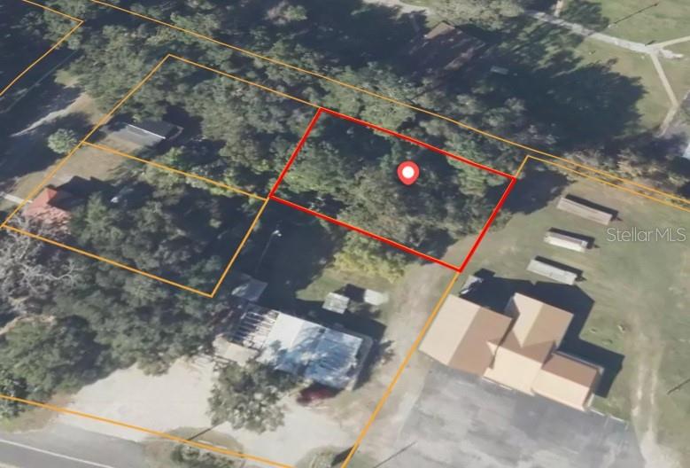 Excellent opportunity to own a commercially zoned B-4 lot in the growing community of Ocklawaha! This versatile property offers outstanding potential for retail, office, service-based business, mixed commercial uses, and more. Conveniently located with easy access to major roadways, Lake Weir, Ocala National Forest, shopping, dining, and outdoor recreation. Whether you’re looking to build your next business venture or invest in the future growth of Marion County, this property offers endless possibilities in a rapidly developing area.