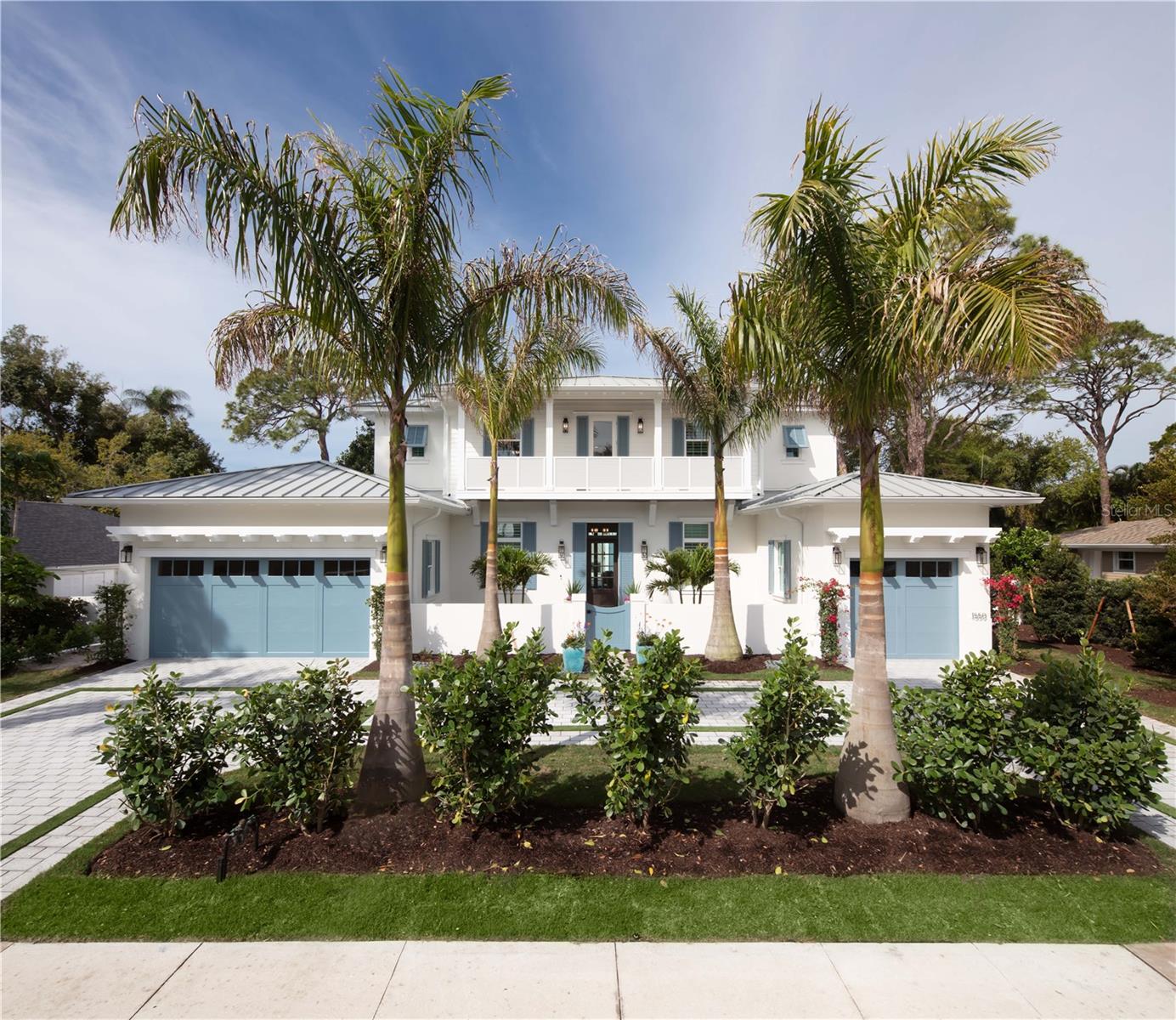 Available Luxury Custom Home. Welcome to the epitome of luxury living in the coveted Harbor Acres community! This magnificent 2-story custom home boasts over 4,000 square feet of living space, featuring 4 bedrooms, 5 and a half bathrooms and a 3-car garage. Step inside and be dazzled by the exquisite design and high-end finishes throughout. The spacious living area is highlighted by soaring ceilings, expansive sliders and a beautiful coral stone fireplace. The gourmet kitchen is a chef's dream, complete with top-of-the-line appliances, custom cabinetry and a large island perfect for entertaining. Retreat to the luxurious master suite, featuring a spa-like bathroom with an outdoor shower and separate his-and-her walk-in closets. Three additional bedrooms, each with their own en-suite bathroom, provide ample space for family and guests. Entertain in style with the vast outdoor living area, complete with an outdoor kitchen, sparkling pool/spa and deck. The focal point of this oasis is a free-standing outdoor fireplace, pergola and seating area, setting the ideal backdrop. The media room is perfect for movie nights, while the guest lounge on the upper floor provides a comfortable retreat for visitors. With an elevator providing easy access to both floors, this home is perfect for those seeking convenience and luxury. Located West of the Trail in Sarasota, you'll enjoy easy access to world-renowned beaches, shopping, dining, and entertainment. Don't miss your chance to own this magnificent luxury custom home in one of Sarasota's most desirable neighborhoods. Schedule your private showing today and experience the ultimate in luxury living!