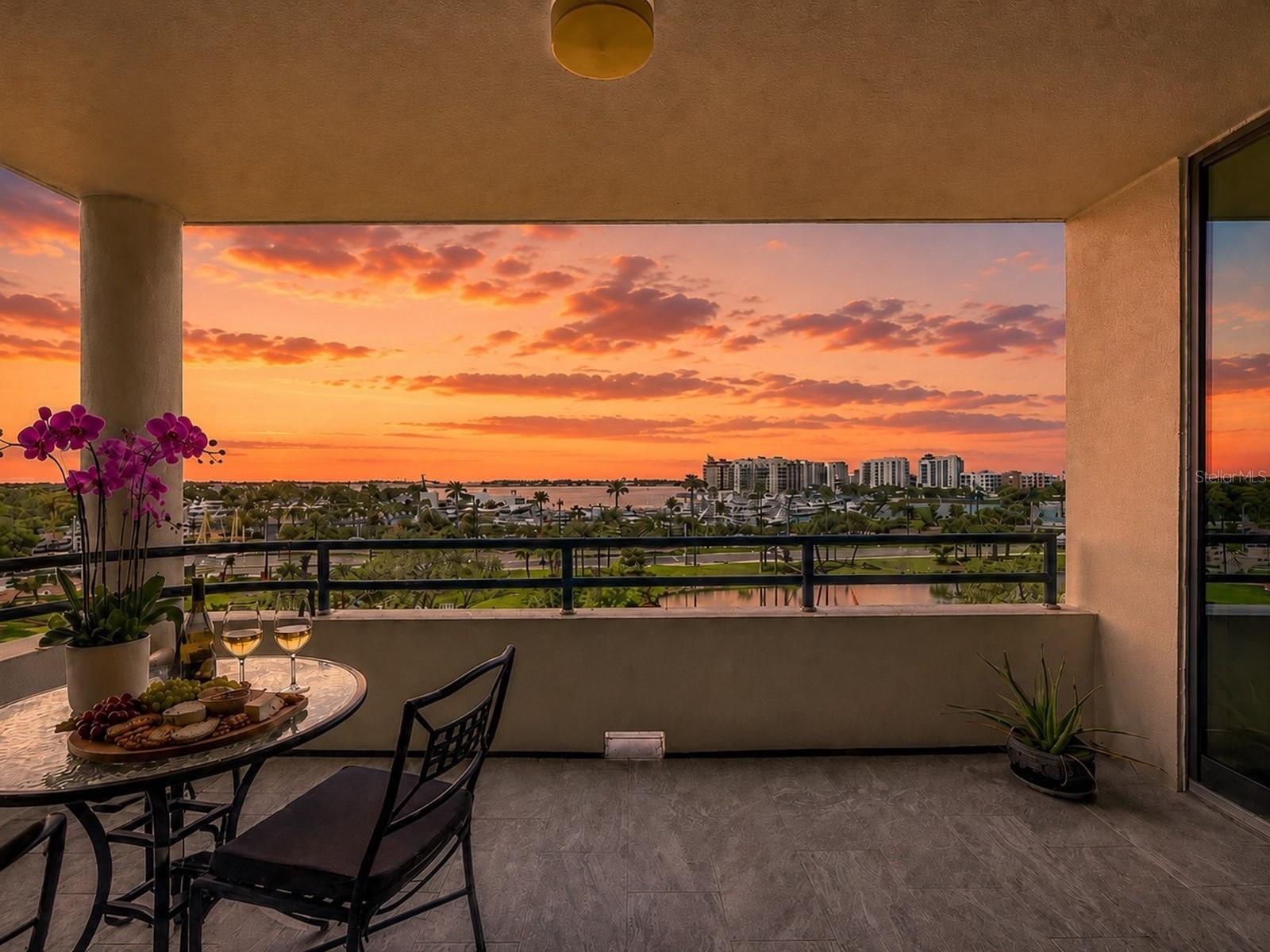 One or more photo(s) has been virtually staged. Experience spectacular Sarasota waterfront living at 1255 N Gulfstream Ave in this 2BR, 2BA res. w/ den & 2 balconies, offering 1,872 total SF, where panoramic bay views & Gulf vistas beyond Big Pass are the undeniable centerpiece. This refined Bay Plaza condo places you at the heart of the city. Floor-to-clg glass doors in the great rm open directly to a covered balcony, perfect for entertaining & enjoying sunset skies & the vibrant energy of the marina & city skyline. The main primary suite is a standout feature, boasting its own private balcony and dramatic ceiling-to-floor glass doors that offer a secluded view of the mesmerizing bay waters and Gulf horizons beyond Big Pass. This space is thoughtfully designed to maximize natural light and showcase the stunning surroundings. Additionally, a secondary bedroom suite provides sweeping views and a beautifully updated bath, offering flexibility and privacy for guests or multi-generational living. Inside, elegant tile floors extend throughout, creating a cohesive visual flow. Substantial enhancements have been implemented, hidden fire sprinkler heads, upgraded electrical & plumbing, new ductwork, soundproof underlayment. Artful millwork draws the eye to impressive high clgs, while contemporary lighting such as LED downlights & designer fixtures, built-in media storage, & floating cabinetry & buffet w/ under-cabinet LED lighting combine style & practicality. The seller invested over $100K in Harmoni cabinetry—a luxury brand renowned for quality & design. Designer shades offer privacy & light control. The state-of-the-art kitchen features a raised clg w/ ambient lighting, quartz counters, contrasting upper & lower cabinets & SS appls., highlighted by a black SS range hood. Plus a serv. entry, a lndry space, & 2nd office area. Accessibility was a key focus in the renovation. The Owner’s suite, main living area, & kitchen are all wheelchair accessible, w/ 2'8" doorways for ease of movement, a fully accessible main closet, & an adapted primary bath. Please note: while most areas are designed for accessibility, some spaces may have limitations based on individual needs. Retreat to a spa-like primary bath w/ elegant natural stone, a floating, European-inspired vanity, complemented by a sep matching vanity w/ a 2nd sink in the wet rm. The zero-entry marble shower features dual shower heads, w/ a recessed rainfall fixt. delivering a spa-inspired experience, complemented by a built-in seat for ultimate relaxation. Both baths feature elevated clgs, and are equipped w/ a premium Schluter shower syst. A dedicated office features a built-in desk w/ Corian, a window seat & etched glass doors for privacy and natural light —an ideal space for flexible living & working. As a resident of Bay Plaza, you will enjoy premium amenities: garaged pkg for 2 cars, 24/7 valet pkg, EV charging, concierge services. & recently installed hurricane-rated sliding glass doors & windows. Unwind at the heated pool, soak in the spa, or stay active in the state-of-the-art fitness rm w/ a sauna & steam rm. Perfectly positioned in the heart of downtown Sarasota, Bay Plaza places you w/in easy reach of trendy restaurants, boutiques, & Sarasota’s vibrant cultural scene, from Whole Foods to the theatre & opera. Take in spectacular 4th of July fireworks at Marina Jack’s from your own balcony, & enjoy quick access to St. Armands Circle, Longboat Key, & the city’s stunning beaches. A detailed list of upgrades is available upon request.