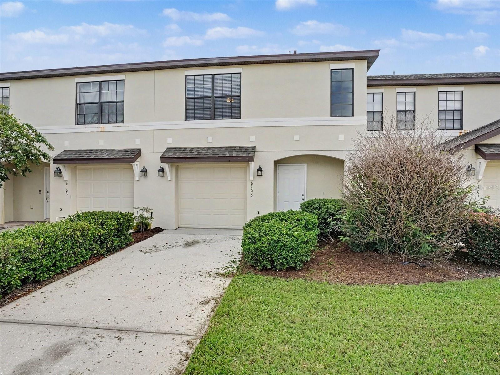 This beautiful 3-bedroom, 2.5-bathroom two-story townhome is perfectly nestled within a secure, highly desirable gated community, offering enhanced privacy and ultimate peace of mind. Step inside to an inviting open layout finished completely in low-maintenance tile and laminate flooring throughout the entire home, completely eliminating carpet for a sleek look that is exceptionally durable and easy to clean. The main level serves as a wonderful hub for daily living and entertaining, featuring an efficient kitchen well-equipped with durable formica countertops and a matching suite of modern stainless steel appliances. Moving upstairs, the second floor is intelligently designed to optimize privacy and ultimate convenience, positioning all three bedrooms alongside a dedicated laundry room so you never have to carry baskets up and down the stairs. Complete with an attached 1-car garage for secure parking and extra storage, this turn-off-the-world townhome is thoughtfully engineered for seamless, low-maintenance modern living.