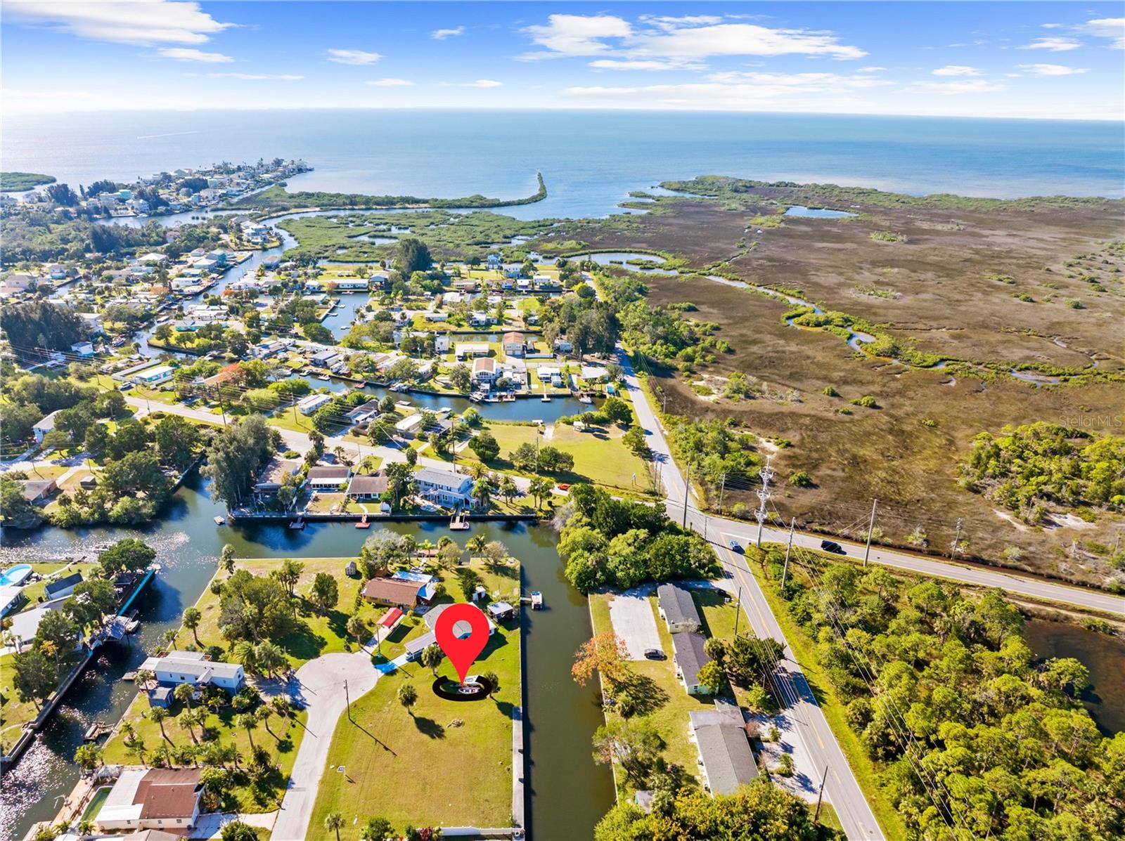 Direct Gulf Access Lot with 62 feet of waterfront, located in Sunset Estates. Saltwater canal lot, located on a dead end street in a cul-de-sac. Concrete seawall, public water/sewer available and endless sunsets. No deed restrictions. Bring your boat, RV, kayaks and fishing gear. The ocean is your backyard. Build your dream home now or later, pick your builder. Tucked away off US 19 for easy commute. Multiple seafood dining options and local conveniences within a 5 minute drive. Under an hour to Tampa airport, Clearwater Beach, Honeymoon Island, Tarpon Springs, Homosassa Springs and Weeki Wachee Springs. Come take a look and start vacationing where you live!