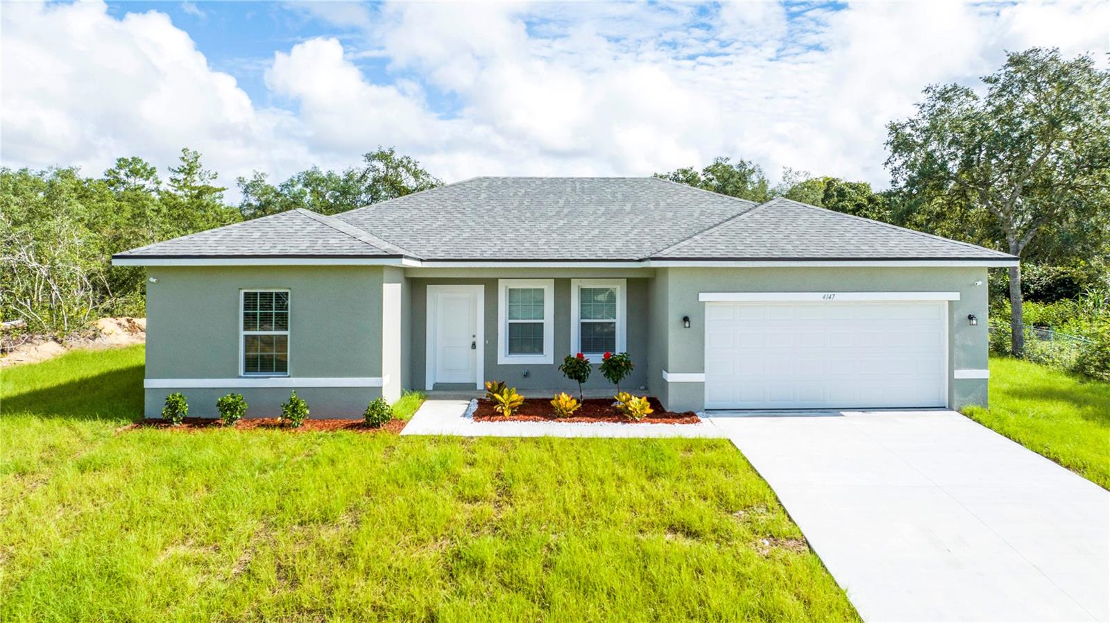 One or more photo(s) has been virtually staged. Under Construction. ** Premium CORNER LOT** Brand new 4-bed/2-bath house with many upgrades. Tile all over the place, even in the spacious bedrooms. Granite countertops in the kitchen and bathrooms. This home will have stainless steel appliances, including a microwave, dishwasher, refrigerator, and range. Take advantage of this opportunity!! WE HAVE MORE NEW HOUSES coming up in Marion Oaks! No HOA, NO CDD. All photos on this listing are of the floor plan model center. Upgrades available. The color and finishes of the home's interior and exterior can be different.
