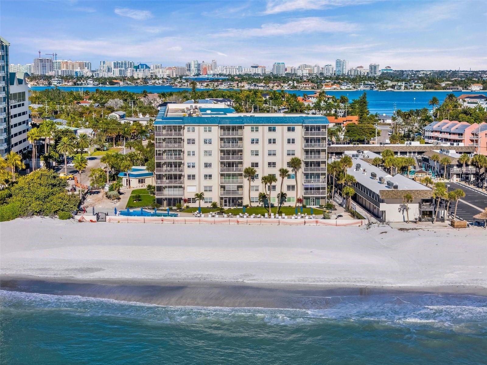 It is rare to find a beachfront unit at this price that offers both a "designer" feel and total peace of mind. This ground-floor home stayed bone-dry during the recent storms—not a single drop of water made its way inside—which is a huge testament to the unit's placement. The interior is fully updated and shows true pride of ownership; you really won't have to do a thing here besides pack your bags and move in.

The lifestyle here is hard to beat. You are less than 100 feet from the sand and the brand-new pool deck, making the beach feel like an extension of your living room. Because the building is right next door to the Lido Beach Resort, you can wander over for a sunset dinner or a casual lunch and truly feel like you’re living the resort life every day. Note: Unit is being sold mostly furnished. See the attached exclusion list for specific items not included.

For those who love being outside, you’re in the heart of it all. You can walk to the boutiques at St. Armands Circle, kayak the mangrove tunnels at South Lido Park, or take the three-mile run over the bridge into downtown Sarasota. Between the "heavenly" sunsets and the unbeatable location, this really is a dream spot for the next owner.