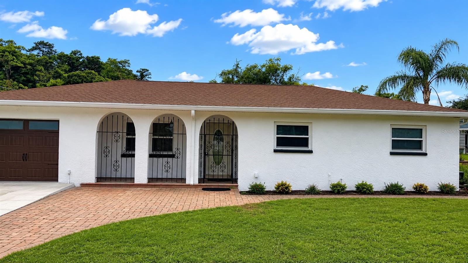 Welcome to a rare and beautiful, 1 owner, home on a large lot. The essence of the home combines convenience and privacy. Being situated on a dead-end street, you'll relax with minimal traffic and a peaceful atmosphere, right in the heart of Tampa. As you step inside, you are entering a spacious dinning room, followed by an updated kitchen and a large living room with a wood burning fireplace. The updated kitchen is bright and spaced well for your culinary creativeness. The laundry room is just outside the kitchen complete with utility sink and countertop. Enjoy entertaining and relaxing in your private backyard oasis, complete with a sparkling pool and a generous screened patio including an outdoor kitchen. Whether you're hosting a summer barbecue or simply unwinding after a long day, this outdoor space is sure to impress. Protect your vehicles from the elements with a convenient carport and an attached garage, offering plenty of storage and parking. Prime location, close to St. Joseph's Hospital, Raymond James Stadium, Lowry Park Zoo, Steinbrenner Field, Tampa international airport and much more. Don’t miss your chance to make this house your home! Schedule your private showing today!
