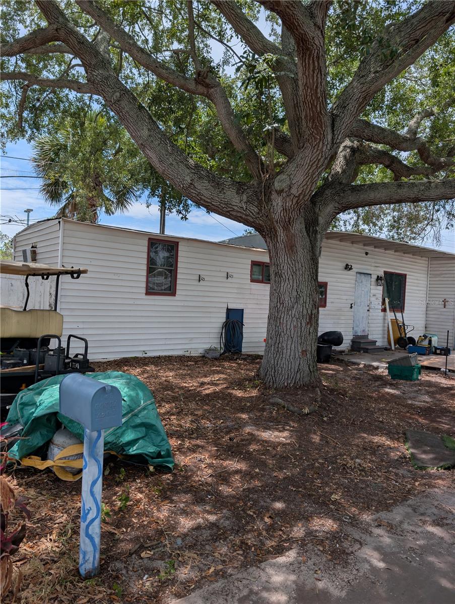 Gem at Sunset Point and US 19.  LAND INCLUDED….NO HOA FEES.  THIS LISTING IS FOR THE LAND WITH THE 2 BR/1BA HOME ON IT W ….HOME IS WITHIN WALKING DISTANCE OF ALDI (3 minute walk with no crossing the street) 1 minute access to US 19 …HAS A GREAT FULLY FENCED BACKYARD READY FOR A BBQ GRILL….GOOD SCHOOLS….