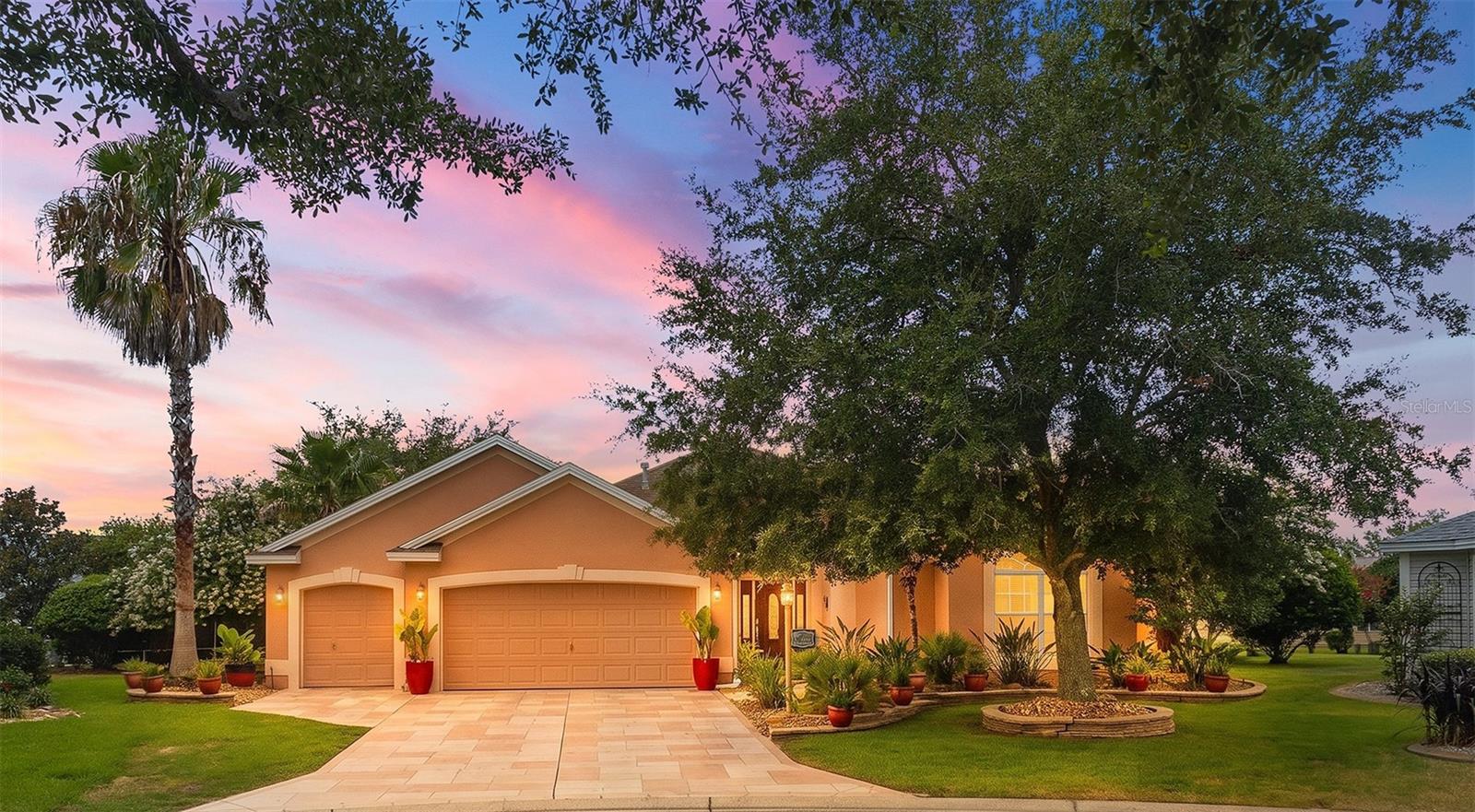 Designer Lantana | Oversized Cul-de-Sac Lot | Tastefully Turnkey | Roof 2022 | HVAC 2025 | Room for Pool | Crown Molding | Tankless Water Heater | Finished Garage | 2022 E-Z-GO Golf Cart Available

Welcome home to this beautifully Lantana Designer Model in the highly sought-after Village of Tall Trees, perfectly positioned on an oversized cul-de-sac homesite with exceptional privacy and room to create your dream outdoor oasis.



From the moment you arrive, you'll appreciate the inviting curb appeal, oversized homesite, and peaceful cul-de-sac location. This tastefully turnkey home has been meticulously maintained and offers the perfect blend of comfort, style, and functionality. Fresh NEW neutral interior paint, elegant crown molding throughout, updated designer lighting, volume ceilings with no popcorn finish, and tile flooring throughout the main living areas create a bright, timeless interior ready for immediate enjoyment.

The spacious open floor plan flows effortlessly from the living and dining areas into the well-appointed kitchen, making everyday living and entertaining easy. The kitchen features pristine appliances, abundant cabinetry with convenient pull-out shelves, a generous pantry, breakfast bar seating, and plenty of workspace for preparing meals while staying connected to family and guests.

The primary suite is a relaxing retreat featuring a customized walk-in closet and an updated ensuite bath with dual vanities and a beautifully tiled Roman-style walk-in shower complete with built-in bench seating. The guest bedroom showcases an elegant tray ceiling, while the guest bath is conveniently located for family and visitors.

The interior laundry room includes a utility sink and additional storage cabinetry, while the finished garage offers extensive built-in cabinets to keep everything neatly organized.

Step outside to the spacious screened lanai, where etched decorative painted flooring and expansive green space create the perfect setting for relaxing or entertaining. The oversized homesite provides a rare opportunity to add a swimming pool, outdoor kitchen, or expanded birdcage while still enjoying plenty of yard space. The north-facing driveway and lanai help provide comfortable outdoor enjoyment throughout the year.

Additional updates include a new roof (2022), HVAC system (2025), tankless water heater, Bose surround sound system in the living room, and, with an acceptable offer, a pristine 2022 E-Z-GO golf cart with hard doors.

Located in one of The Villages' most popular neighborhoods, the Village of Tall Trees offers an unbeatable central location just minutes by golf cart to Lake Sumter Landing Market Square, Spanish Springs Town Square, championship and executive golf courses, recreation centers, pools, shopping, restaurants, medical facilities, and the Highway 466 shopping and dining corridor.

Beautifully updated, exceptionally maintained, and ideally located, this Designer  Lantana offers the Florida lifestyle buyers are searching for in one of The Villages' most desirable neighborhoods.