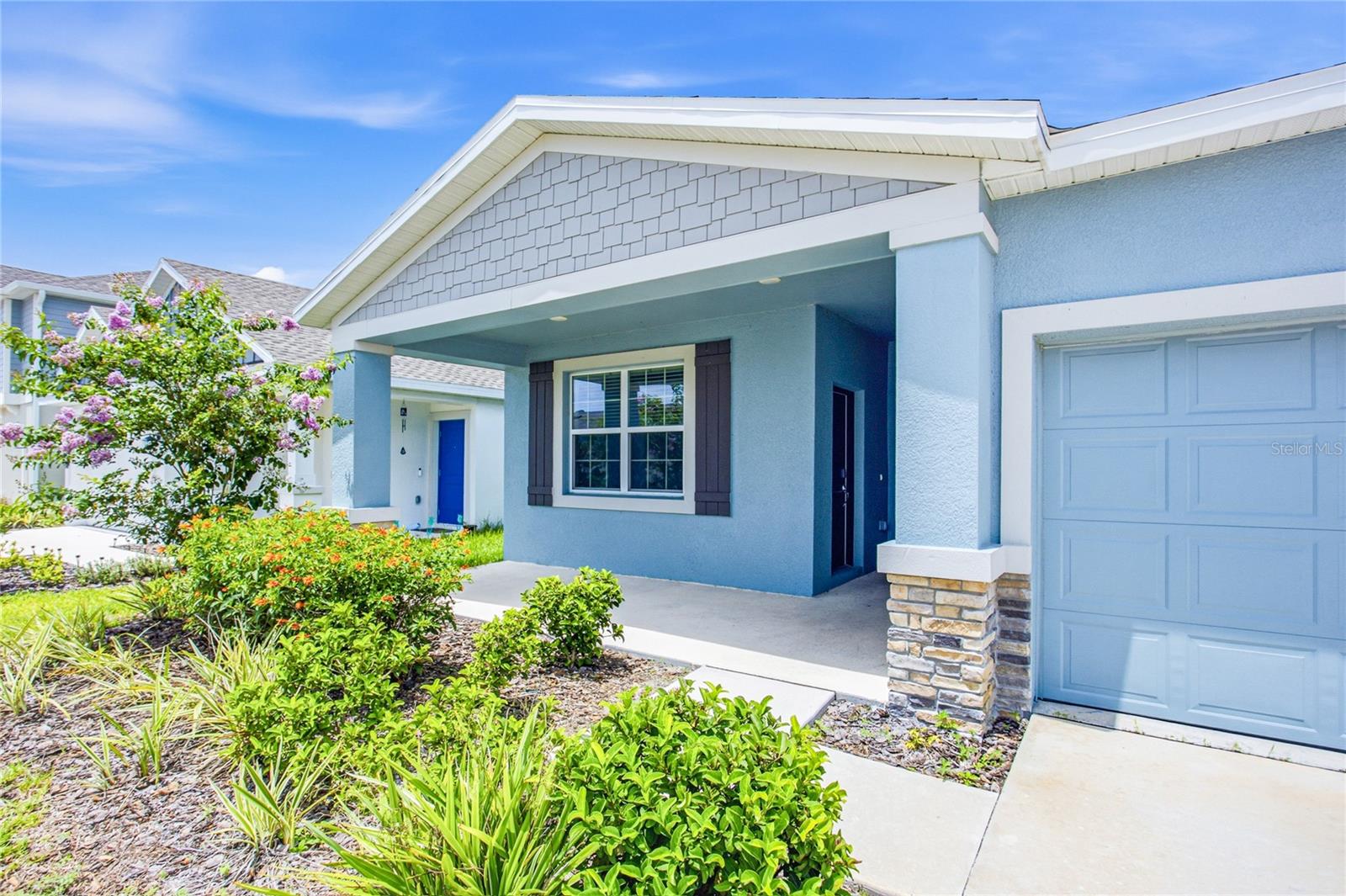 Built in 2024, this single-story home in Peace Creek Reserve offers the Freedom floor plan with a dedicated office and a private Next Gen suite — its own entrance, bedroom, living area, kitchenette, and full laundry, independent from the main home's own laundry setup. Inside, an open-concept kitchen with quartz countertops, stainless steel appliances, an oversized island, and a walk-in pantry flows into bright, naturally lit living and dining areas. The primary suite offers a private bath with dual sinks and a walk-in shower, while two additional bedrooms with walk-in closets provide space for family or guests. A covered patio extends the living space outdoors. HOA dues are just $199 a year, billed once annually rather than monthly — among the lowest in the area. Community amenities include a pool, playground, and a scenic natural creek, with easy access to Winter Haven's chain of lakes, area parks, shopping, and dining. The home is currently vacant, allowing for a flexible closing timeline for buyers ready to move quickly.