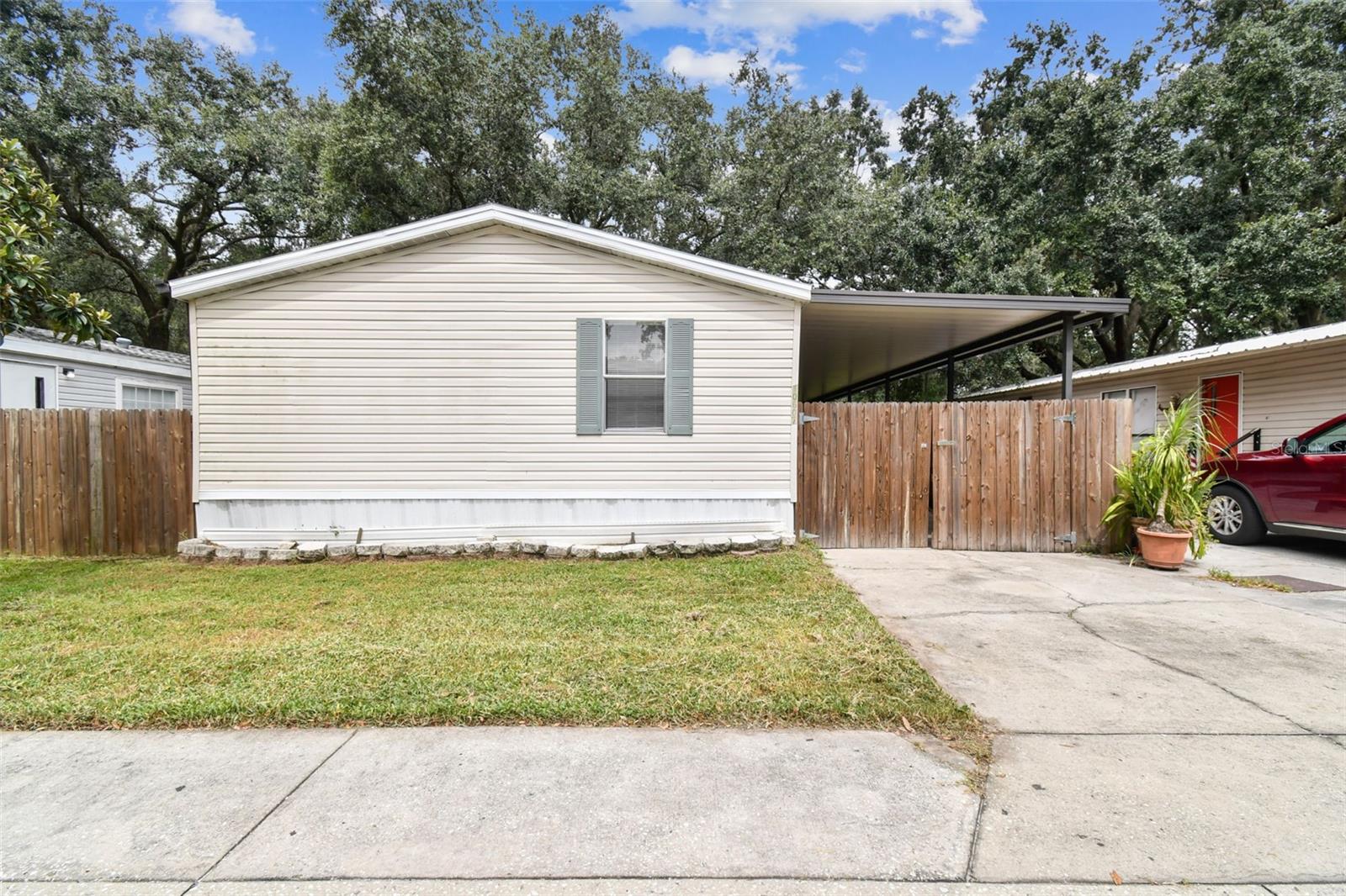 ***First time home buyer special!*** Seller will credit buyer up to $6,000 towards their closing cost! Please bring all offers, seller likes to negotiate! Has community pool, Located in the heart of Thonotosassa fl near everything , close to interstate 75, Lake Thonotosassa , USF , Busch gardens theme park , florida state fair ground , Tampa executive airport, Publix, Lowe’s, Home Depot, Walmart and other major stores. Recent updates including, new laminate floors throughout the home, new interior paint, updated guest bathroom $161 low Monthly Hoa includes water , trash and sewage. Land included with sale of moble home. Home can be rented for $2,000 to $2,200 a month , tenant placement available...Call to schedule a walk through today!!
