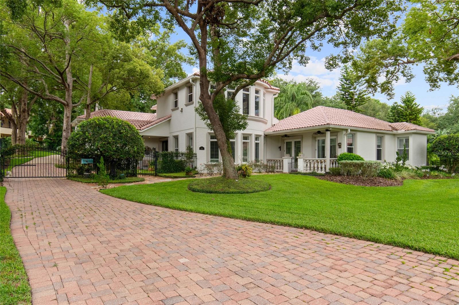 Welcome to this beautifully crafted home built in 2004, located in the private, gated community of Spring Lake Pointe, just moments from the lake and convenient access to I-4, 436, Maitland, and Winter Park.

Situated on a generous half-acre lot, this 4-bedroom, 5-bathroom home offers thoughtful design across three expansive levels.

The main floor features the heart of the home: a warm and inviting living room, a formal dining room, a stunning chef's kitchen that was renovated in December 2025 with brand new appliances, and a secondary laundry area for added convenience. Also on the main level is the impressive primary suite, offering true privacy and comfort with two full bathrooms, two walk-in closets, a private kitchenette, and its own washer and dryer. A second bedroom with a full bath is also located on this floor, ideal for guests or flexible use.

On the second floor, you will find two additional bedrooms that each have their own private bathrooms, providing space and privacy for everyone.

The third floor is a standout feature: a large bonus room complete with a fireplace and built-in bar, perfect for entertaining, movie nights, or creating a cozy retreat.

Step outside to a tranquil full fenced backyard oasis, where a saltwater pool and pergola-covered seating area invite you to relax, dine, and enjoy the peaceful surroundings of this quiet, well-kept neighborhood. Want to head out on the lake? Walk 50 steps over to the private boat ramp that allows private access to Spring Lake. 

This home is also available for lease and is a rare opportunity to own/rent a truly special home in one of Altamonte Springs’ most desirable communities. Call today for your private showing!