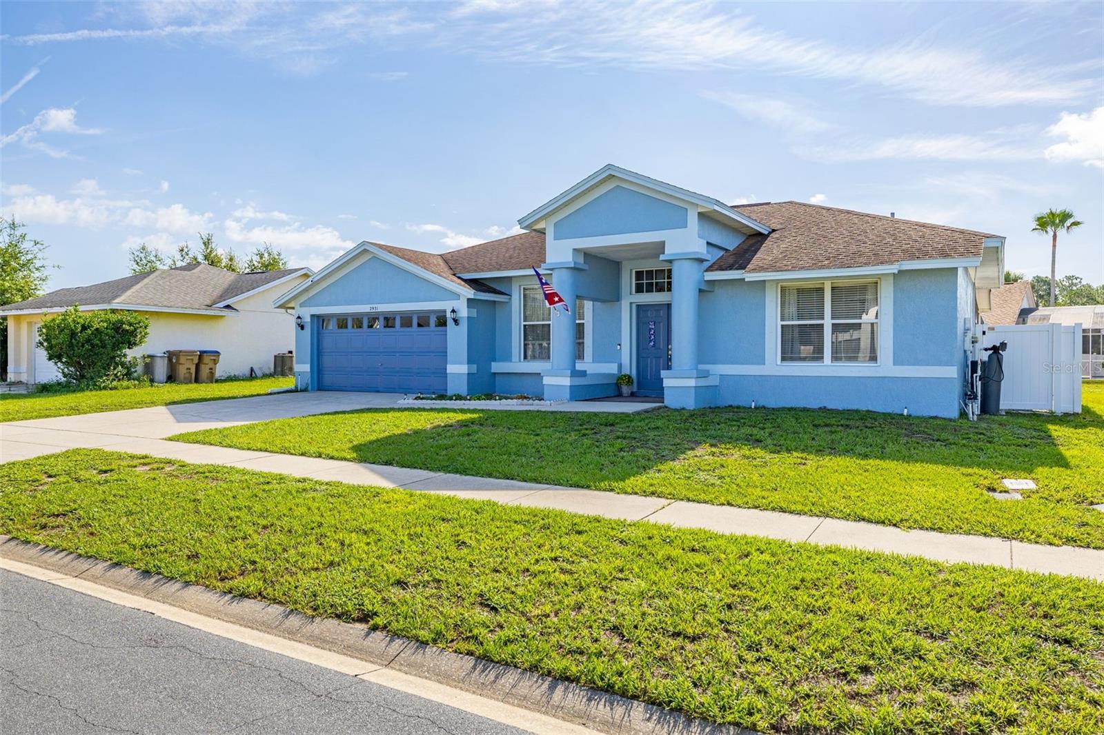 Welcome to your own private Florida retreat in the heart of Kissimmee! This beautifully maintained 4-bedroom, 2-bath pool home offers over 2,150 square feet of thoughtfully designed living space with no HOA and is perfectly suited as a primary residence, vacation home, or investment property.

Step inside to discover a bright, open floor plan featuring spacious living and dining areas, durable tile and wood-look flooring, and a desirable split-bedroom layout for added privacy. The oversized kitchen offers abundant cabinetry, generous counter space, stainless steel appliances, a breakfast bar, and a cozy eat-in dining area that overlooks the family room—ideal for everyday living and entertaining.

The spacious primary suite is a relaxing retreat with a walk-in closet and an en-suite bath featuring dual vanities, a garden tub, and a separate walk-in shower. Three additional bedrooms provide flexibility for family, guests, or a home office.

Outside, enjoy Florida living at its best in your screened lanai with a sparkling private pool and spa. The pool was resurfaced in 2021, creating the perfect setting for relaxing or hosting friends and family. The fully fenced backyard offers additional privacy and space to enjoy the outdoors.

This home also provides exceptional peace of mind with a new HVAC system (2024) and new water heater (2024). The attached two-car garage is equipped with electric vehicle charging capability, making it easy to keep your EV powered and ready to go.

Conveniently located just minutes from Walt Disney World, major attractions, shopping, dining, golf, and Orlando's major roadways, this move-in-ready home combines comfort, convenience, and valuable updates in one outstanding package.