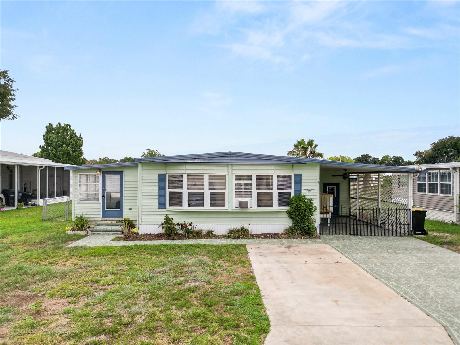 Welcome to easy living in Citrus Woods, an active 55+ community! 

This two bedroom, two bathroom home is priced to sell and is ready for its new owner to give it the updates it needs and add their personal touch! 

Inside, you will find an open floor plan with a cozy living room that flows into the dining area and kitchen with granite counter tops, creating a comfortable and functional layout. Next to the living room, the Florida room has great natural light and would be a great spot to sip your morning coffee or unwind at the end of a busy day! 

Additional features include the utility room with laundry room, newer windows, a carport and a large yard that is already fenced in offering everything you need in one great home.

Citrus Woods fosters a vibrant lifestyle where neighbors connect at the heated pool, community center, and frequent social events—all with the added peace of mind of an on-site sheriff’s station. This home perfectly balances comfort and convenience, sitting just minutes from premier shopping, dining, medical care, and the heart of downtown. 

Schedule your showing today!