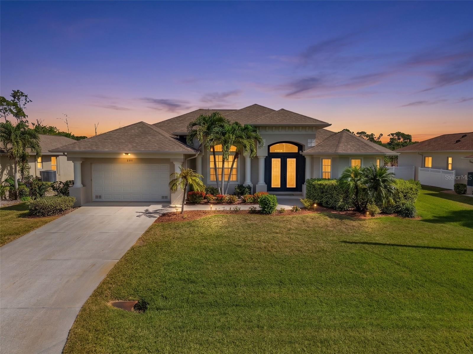 Welcome to this beautifully maintained pool home in Rotonda West, situated on a deep, private lot with no rear neighbors. Designed for comfortable Florida living, this home offers an open, light-filled layout with high ceilings, large windows, and pocketing sliding glass doors that open the living space directly to the lanai and pool area.
The kitchen sits at the center of the home and features granite countertops, abundant cabinet space, a prep island, breakfast bar seating, a pantry, and a sunny dinette overlooking the pool through an aquarium window. Whether you're hosting family and friends or enjoying a quiet morning coffee, this space is designed to bring everyone together.
The split-bedroom floor plan provides privacy for both owners and guests. The spacious primary suite includes walk-in closets and an en-suite bath with dual vanities, a garden tub, and a walk-through shower. One of the guest bedrooms offers direct access to the pool area, while the third bedroom is perfect for guests, a home office, or a hobby room.
Outside is where this home really shines. The screened lanai offers plenty of covered seating space along with a heated saltwater pool and spa, making it easy to enjoy the Florida lifestyle year-round. There's also a convenient pool bath, outdoor shower, and a pre-plumbed area for a future outdoor kitchen. With a large backyard and no homes directly behind you, you'll appreciate the extra privacy whether you're entertaining guests or simply relaxing by the pool.
If you're looking for a home that combines indoor comfort with exceptional outdoor living, 1146 Rotonda Circle is one you won't want to miss.
