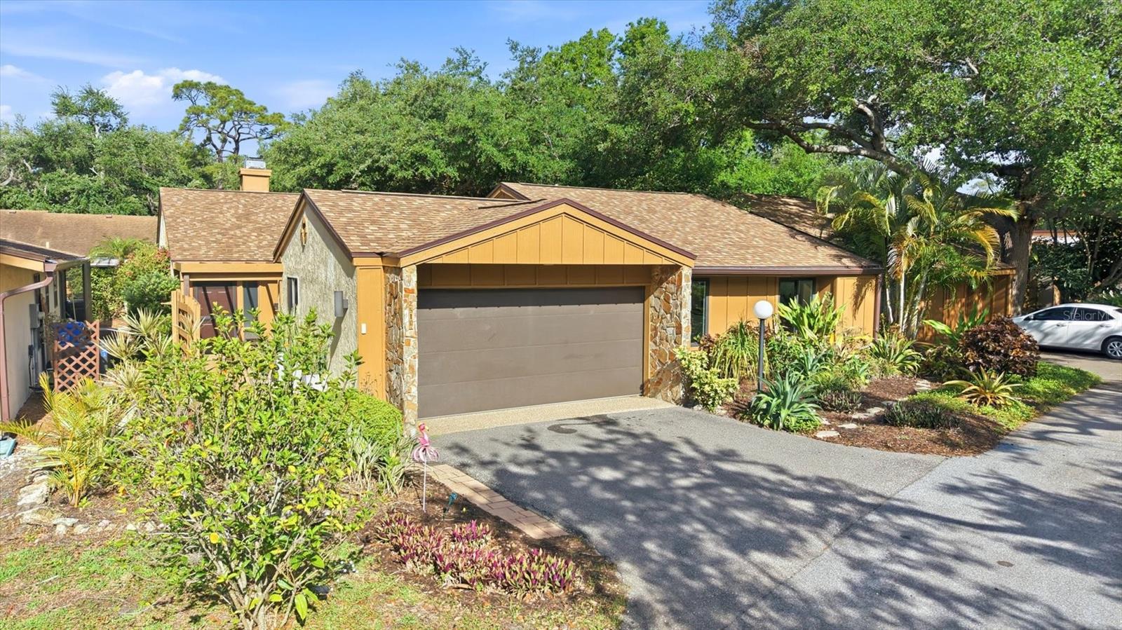 What most buyers quickly realize when searching in this price range is that you’re often choosing between an older home that needs work or a property that lacks privacy. This home solves that problem.
Located in Tanglewood, this property lives like a true single-family home, yet it offers the simplicity of a land condominium. You own the land, there are no neighbors above or below, no shared walls, and no elevators—just the privacy and ease that today’s buyers are looking for, especially those relocating and wanting a low-maintenance lifestyle without compromise.
The difference here is that the bulk of the work has already been done. With a new roof in 2025, updated HVAC in 2022, a new electrical panel, and a new hot water heater in 2024, the big-ticket items are out of the way, allowing the next owner to focus on enjoying the home rather than updating it.
Inside, the home has been thoughtfully refreshed to deliver a clean, modern feel throughout. The kitchen has been upgraded with refaced cabinetry, stunning quartzite countertops, a new sink and faucet, and stainless-steel appliances, all complemented by brand-new LVP flooring. Fresh interior paint enhances the light, bright, move-in-ready atmosphere, while the updated primary bathroom further reflects the home’s quality and attention to detail.
Comfort and functionality continue throughout the home with features such as a water softener, a reverse osmosis system, custom motorized blinds on the sliders, and room-darkening blinds in the bedrooms. Recent improvements extend to the exterior as well, including new windows at the front and rear of the home, a new front door, an updated garage door, and new gutters.
Just as important as the home itself is the location, and this is where Tanglewood truly stands out. You are just minutes from the beaches of Anna Maria Island, close to the expansive recreation and amenities of GT Bray Park, and conveniently located to both Sarasota and SRQ Airport, making travel and everyday living easy and accessible.
Set within an established Bradenton community with mature landscaping and a welcoming feel, this home stands apart for its combination of privacy, upgrades, and ease of ownership. For buyers who don’t want a project, don’t want shared walls, and don’t want the uncertainty of older systems, this is a rare opportunity to step into a home where these issues have already been addressed. Low condo fee of $305 / month includes cable, internet, heated pool and tennis court.