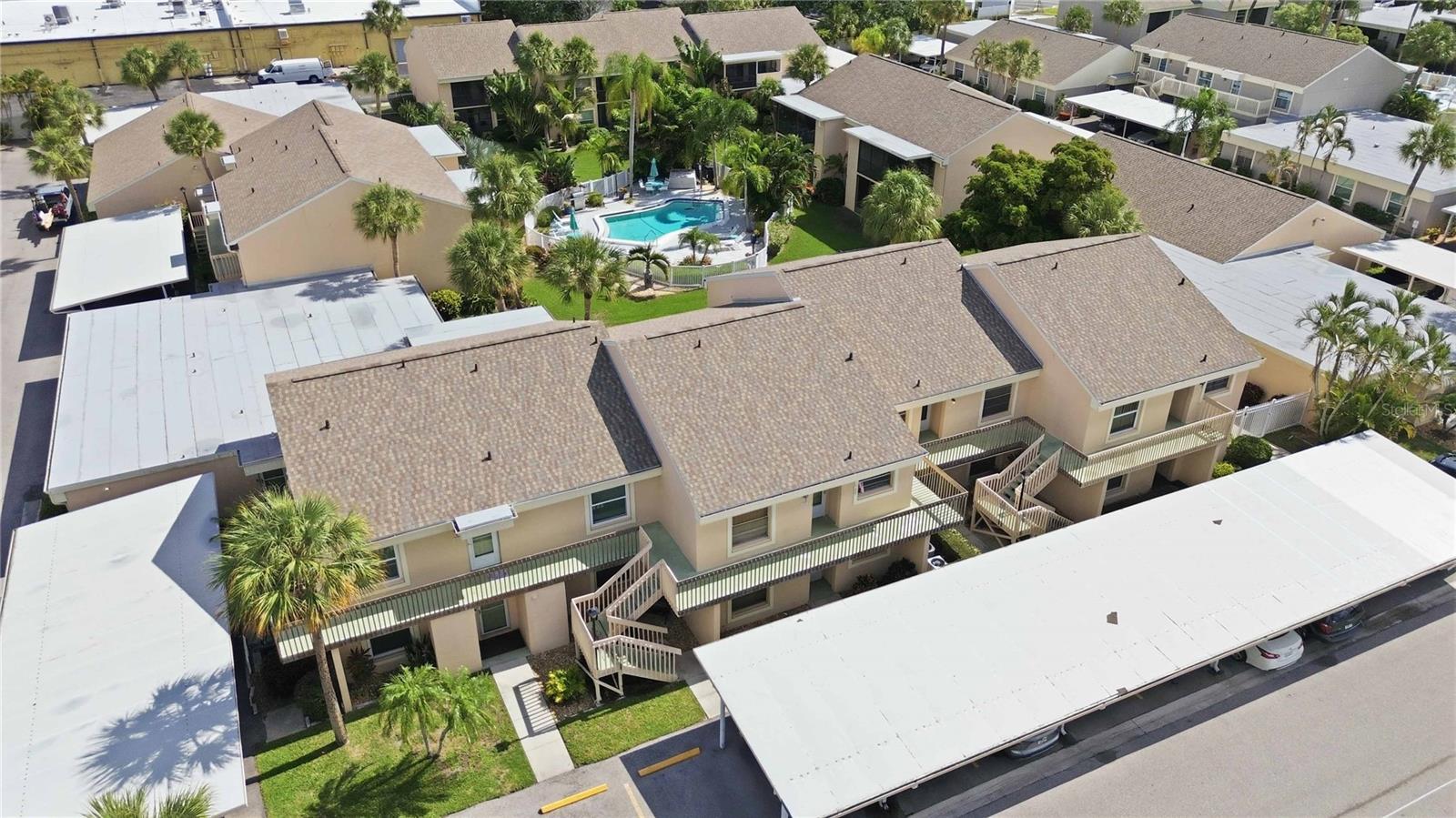 Location, location, location! Nestled in the highly desirable West Bradenton community of Pebble Springs, this charming 2-bedroom, 2-bathroom, second-floor condo offers the ultimate coastal lifestyle, making it an incredible opportunity for a first-time homebuyer, a savvy investor, or anyone seeking the perfect low-maintenance vacation retreat. The absolute standout feature of this property is its unbeatable location; you are just a short, straight drive from the pristine beaches of Anna Maria Island and within easy walking distance to local shopping, dining, grocery stores, and cafes. Beyond its prime positioning, this unit offers incredible peace of mind with a new roof installed in 2025 and the special assessment already paid in full. After a day of exploring the area, you can relax on your private, screened-in porch, which offers peaceful, direct views of the refreshing community pool. Opportunities in this sought-after West Bradenton location do not last long, so schedule your showing today and secure your own slice of the Florida dream!