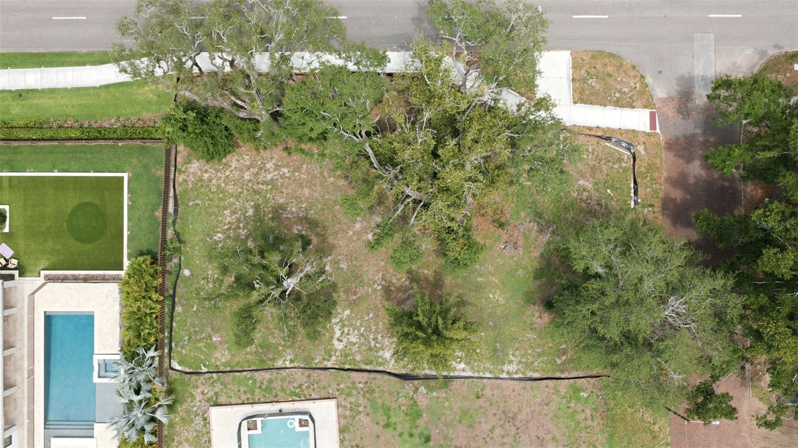 If you’ve been waiting for the right opportunity in Allendale… this is where your search ends—and your vision begins.  Because opportunities like this don’t come along often: a cleared homesite positioned on one of the most desirable stretches of 40th Avenue North, surrounded by estate-caliber residences that define the character and prestige of this iconic neighborhood. Set on a generous 75x131 footprint, this property is zoned NS-1, offering flexibility in design and construction.  And here’s what truly sets it apart… All of this is located in a NON-FLOOD ZONE, a rarity in St Petersburg, giving you confidence as you build your custom residence exactly the way you’ve envisioned it—without compromise.  Picture tree-lined streets, timeless architecture, and a neighborhood known for its charm, stability, and enduring demand. This is the kind of address that holds value… and elevates it. So the real question becomes: What would you build here—if you knew you couldn’t go wrong? Because lots like this don’t wait… And neither do the buyers who recognize them.