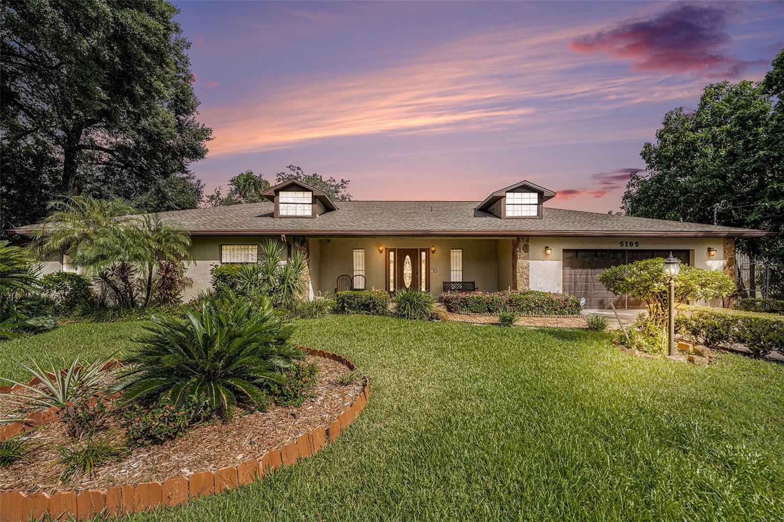 Welcome to a truly rare opportunity offering endless possibilities on a sprawling 2.23-acre homesite tucked away on a peaceful dead-end road. This meticulously maintained property features a spacious 3,844-square-foot main residence with 5 bedrooms, 3 full bathrooms, and 2 half bathrooms, providing plenty of room for family, guests, hobbies, and entertaining.

Adding even more value and flexibility, the property includes a detached mother-in-law suite and a separate detached garage, creating the ideal setup for multigenerational living, guest accommodations, home-based businesses, workshops, or additional storage.

Nature lovers will appreciate the privacy, mature surroundings, and wide-open space this exceptional property provides. Whether you dream of creating lush gardens, adding recreational amenities, storing boats, RVs, and toys, or simply enjoying the serenity of acreage living, this property offers the freedom to bring your vision to life.

For investors, builders, and developers, the opportunities are equally compelling. With approximately 2.23 acres of land, this property presents significant redevelopment potential, making it an attractive option for a future family compound, luxury estate, custom home community, or other development opportunities. Whether you choose to preserve the existing improvements or reimagine the site entirely, the possibilities are truly endless!

Properties offering this combination of acreage, privacy, existing improvements, and future potential are increasingly difficult to find. Don't miss your chance to secure one of the area's most versatile and opportunity-filled properties! Schedule a showing today!