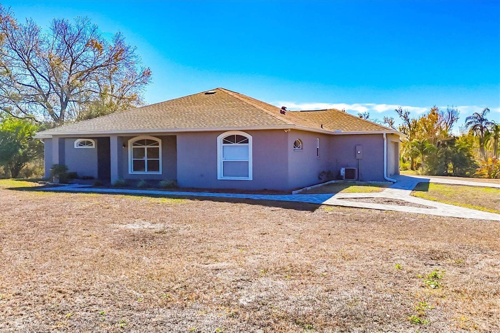 WATERFRONT! WATERFRONT! WATERFRONT! 6.3 Acres - Non-Deed Restricted Custom 3Bd/2Ba (open floor plan) home on Lake Manatee with a 85 ft dock and a 16x15 platform.  This home has been well loved and taken care of and is ready for a new Owner to call home.  5 miles east of the new Publix being built at SR 64/Uhlein.  Screened in porch has wonderful Waterviews and the composite dock is perfect for throwing your line in to catch a bass or crappie.  Enjoy the Country life while being a short 10 minute drive to Lakewood Ranch shopping, restaurants, and more.  New Roof, Luxury Vinyl Flooring, Interior and Exterior painting, stainless appliances, faucets and toilets, water softener and advanced water system all updated in 2023.  Detached RV Shed 42x14 feet with electric and designed for winds up to 130 mph.  New gutter in 2024.  Zoned for Horses.  Schedule a showing to view this wonderful Lakefront property.