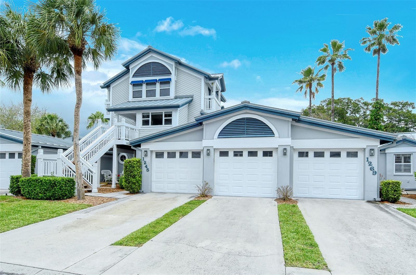 PRICE IMPROVEMENT! Priced to Sell!! Amazing year-round residence, vacation or investment property. Just across the street from world famous Siesta Beach with dedicated beach access. This 2 bedroom 2 bath unit is beautifully turnkey furnished - just bring your clothing and prepare to enjoy the Siesta lifestyle! Rare 2 single car attached garages. Renovated with wood cabinets, granite, stainless appliances, and beautifully tiled baths. Three televisions, master with king bed, 2 doubles in the second bedroom and sleeper sofa in the family room make this unit livable for multiple guests. Two eating spaces - the kitchen nook and the tiled lanai overlooking the scenic pond make this unit ideal for entertaining. Minutes to fun eclectic Siesta Village and mid-Key village and restaurants. This resort property is unparalleled -- the Key West style gated community affords 2 pools, great clubhouse, fitness, tennis courts, pickle ball, saunas, barbeque grills, walking paths and fishing pier. A private one car garage and rare additional one car attached garage - one for personal use and one for your tenants. Driveway parking. New HVAC, water heater, and electric panel. One week minimum rentals combined with an optional on-site rental office make this an excellent investment property. Take advantage of rental income from reservations through season 2024. This is a unit you should definitely see!