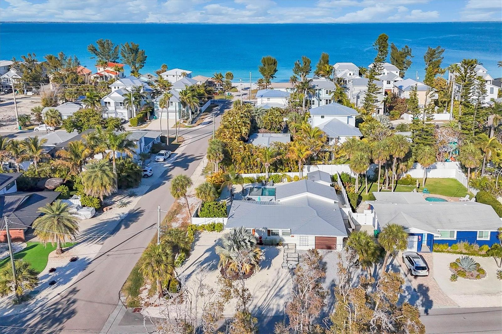 Located just blocks from the beach, White Palms is a 3-bedroom, 2-bathroom island home situated on a large corner lot with a spacious backyard, offering excellent outdoor living close to the Gulf. The corner location provides added openness, while mature palms and established landscaping create a private coastal setting. The home features a bright, open layout designed for comfortable island living, with well-sized bedrooms and recently updated finishes throughout. The main living areas connect seamlessly to the outdoor spaces, making it ideal for both everyday living and entertaining. The backyard centers around a private pool, creating a true outdoor retreat with ample space for lounging and gathering. Whether used as a primary residence, second home, or seasonal escape, the layout offers flexibility and function.
Located in Anna Maria's nightly vacation rental area, White Palms is an established rental property with documented income, offering immediate investment potential alongside its lifestyle appeal.
Just a short walk to the sand, this property combines beach proximity, outdoor space, and proven rental performance in one well-located island home.