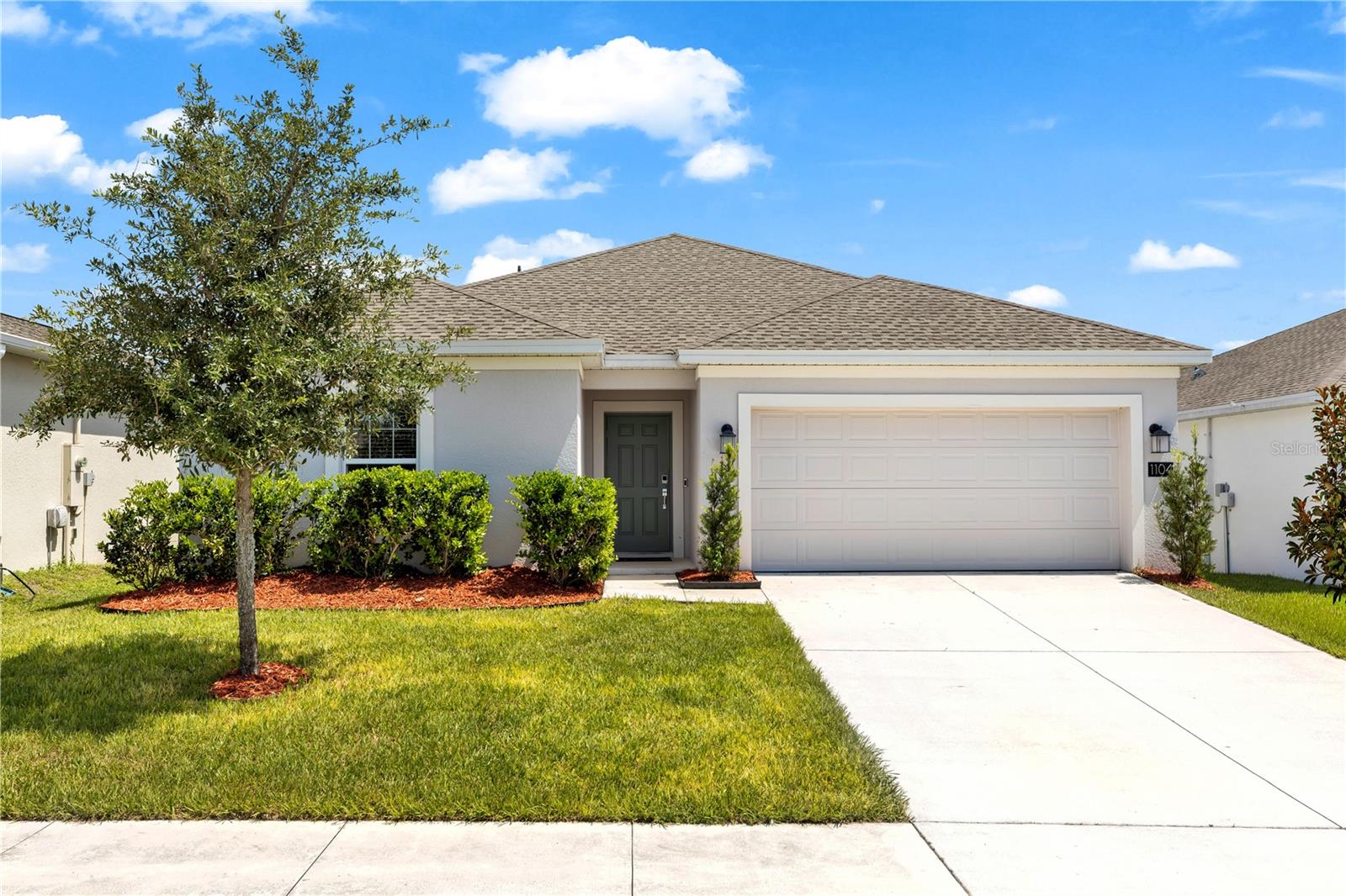 Welcome to 1104 Peach Creek Drive, where modern living meets the peaceful charm of Osteen. Built in 2023, this move-in-ready home offers all the benefits of new construction without the wait. Featuring a bright, open-concept layout, stylish finishes, and low-maintenance living, it's the perfect place to settle in and make your own. Life in Osteen offers the best of both worlds a quiet, small-town atmosphere with easy access to Sanford, Lake Mary, New Smyrna Beach, and Daytona Beach. Outdoor enthusiasts will love being close to the St. Johns River, hiking and biking trails, parks, and endless opportunities for boating, fishing, and exploring nature. With more space, less congestion, and a growing community, Osteen is an ideal choice for those looking to enjoy a slower pace of life while staying connected to everything Central Florida has to offer. Whether you're a first-time homebuyer, looking to downsize, or simply searching for a newer home in a peaceful setting, 1104 Peach Creek Drive is one you won't want to miss. Ages of Roof, A/C and Water Heater - 2023