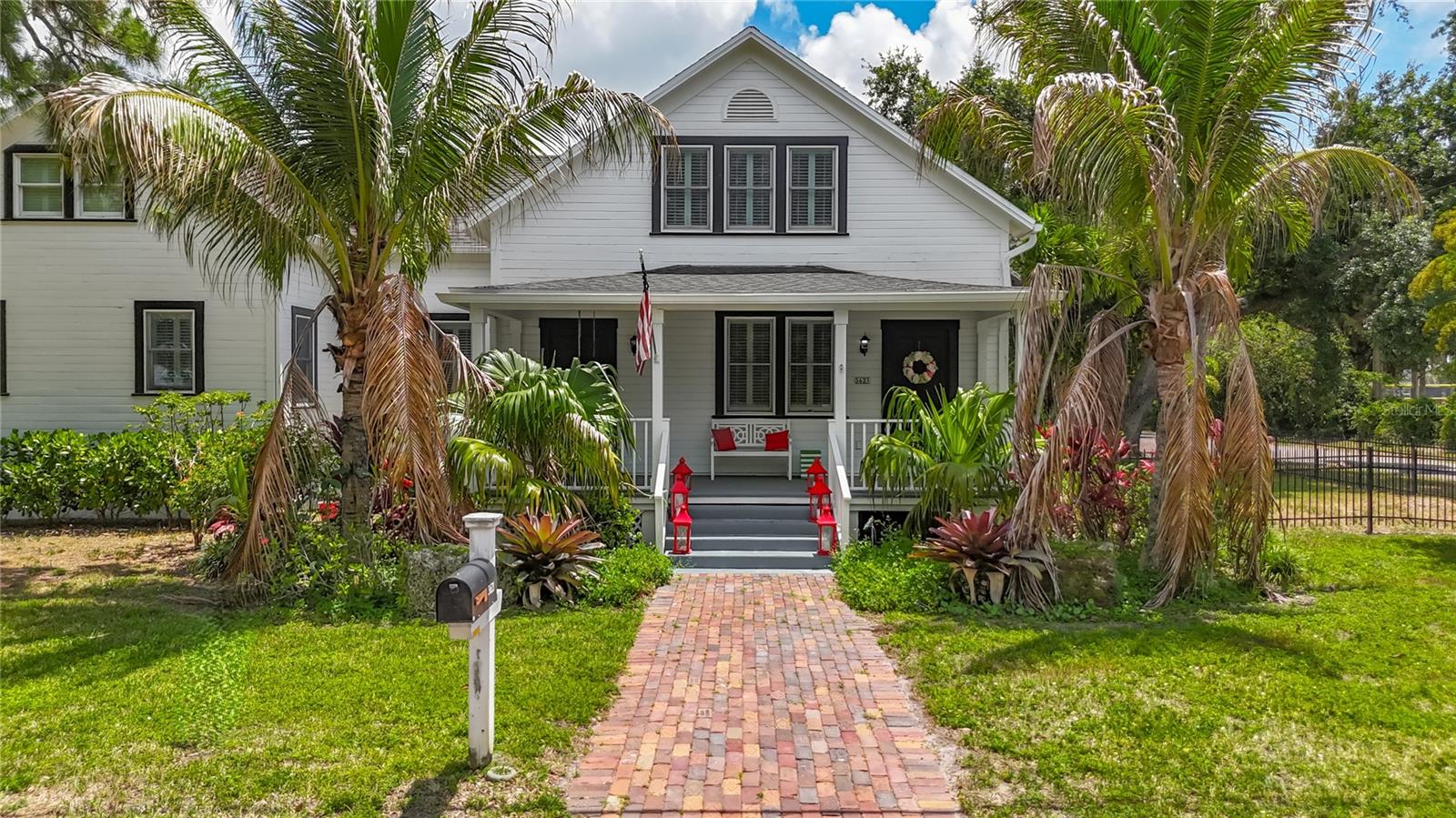 Step into timeless Florida charm with this beautifully preserved home in the heart of Bradenton. Blending historic character with everyday comfort, this 3-bedroom, 2.5-bath residence offers classic architectural details, warm inviting spaces, and the unique personality only a true vintage home can provide.

Originally constructed in 1888 six blocks east at the corner of First Avenue West and 31st Street West as the first Catholic Church in Manatee County.  As Bradentown (now known as Bradenton) began to grow in the 1920s, the church was decommissioned, moved to its current location at the corner of First Avenue West and 37th Street West and the structure was converted into this one-of-a-kind private home.  Some small parler rooms were added at that time, but the house still retained many of its original 1888 features.  Most notably, this includes the two front doors and two back doors.  While some parts of the interior have changes, the exterior of the home largely maintains the original look from 1888.  In the early 2000s, a full renovation took place, including a remodeling of the kitchen and upstairs beds and bath.  Just a few years later, another renovation occurred that added a large addition on the east side of the home which added a master suite, master bath, large family room and laundry room.  

From the moment you arrive, you’ll appreciate the home’s distinctive curb appeal, mature landscaping and old-Florida ambiance. Inside, original charm meets functional living with spacious bedrooms, abundant natural light, and flexible living areas perfect for entertaining or relaxing. The thoughtfully designed layout includes a comfortable primary suite, generous guest rooms, and convenient half bath for visitors.

The kitchen and living spaces create a welcoming atmosphere while preserving the home’s historic soul. Whether you’re enjoying a quiet morning coffee on the large porch or hosting friends and family, this home delivers character and comfort in equal measure.

Located near downtown Bradenton, local dining, shopping, parks, and Gulf Coast beaches, this rare vintage gem offers the opportunity to own a piece of Florida history while enjoying modern-day convenience.