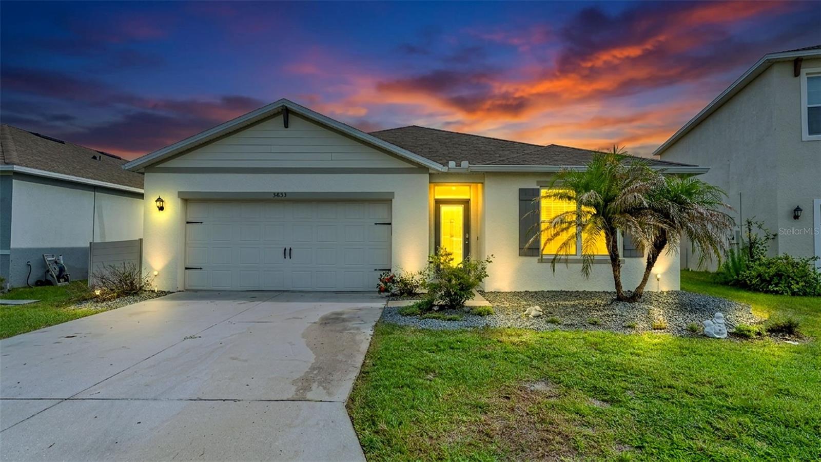 Welcome to this beautiful home in the sought after Riverstone Community. This 4-bedroom, 2-bathroom, split floor plan is a gorgeous open concept home that is minutes away from Sun and Fun yearly event. The kitchen has a walk-in, built out pantry to store food and bakeware. The Stainless steel appliances, granite countertops, and prep island are any chef's dream. The sink faucet has been replaced so that cleaning up is efficient. The 2-car garage has been epoxied so that everything stays looking like new. The beautiful primary bathroom has been updated to include a tiled shower with a glass door. The bathroom linen closet and primary walk-in closet have been customized to keep life organized. The screened in porch with the lake view is as stunning as the sunsets that can be viewed every night. The house is located on the bend so traffic is minimal. The community offers 2 pools, community center, walking trails, dog park,, and fitness stations. The home is located a short drive from the I-4 and SR60 that lead to Orlando, Tampa, and all the fun spots in Florida. Lakeland is home to many head quarters including Publix, Geico, Carrier, and many more. Please schedule a viewing before this gem is gone.