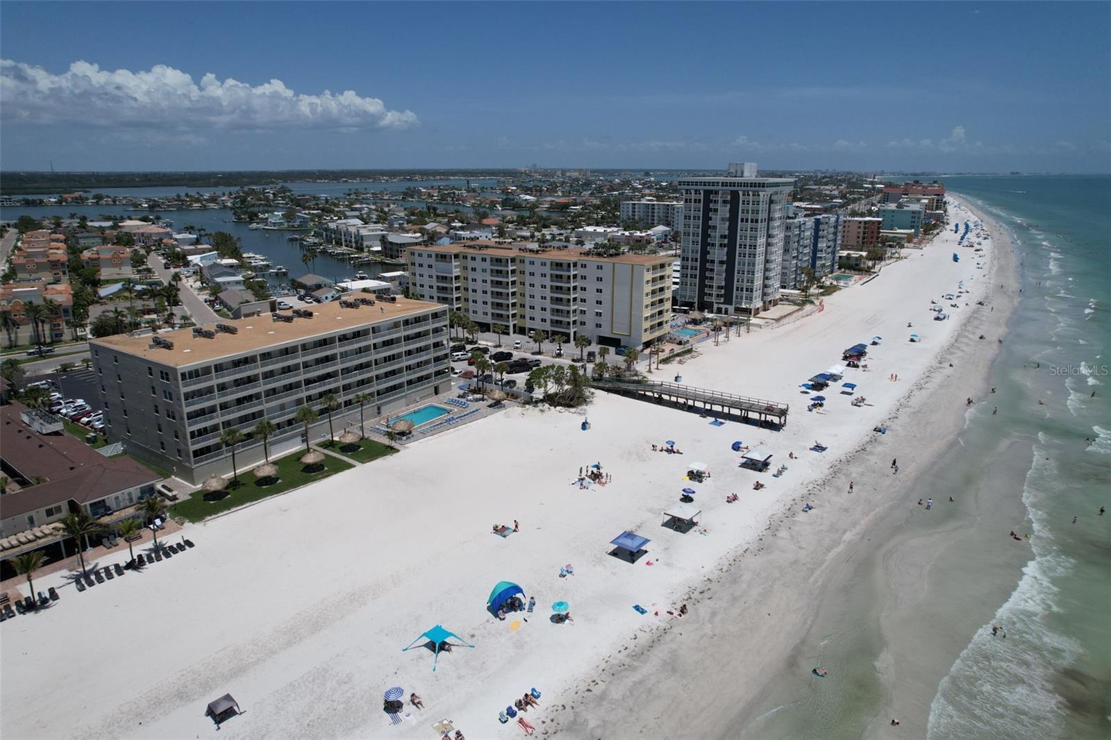 Direct Gulf/Beach front.  RARE 3 bedroom/3 bath condo. Private balcony with direct views of the beach and Gulf.  This condo is fully furnished and has three bedrooms and three full baths.  Large Gulf front balcony and a spacious 1450 square feet of interior living space.  Comfortably furnished and turnkey ready. Tile and wood-look flooring. Bathrooms have recent updates.  Each bedroom has its own bathroom. The condo is large with an open floor plan and can easily accommodate 10.  Great accommodation for families. Angler's is the perfect second home and/or vacation rental.  This paradise can be income producing, your own private get away or a bit of both.  Strong rental history. Records available. Short-term rentals are allowed. Well established rental management available or do it yourself.  Two parking spaces available and owners may use one space under the building. The condo also has impact/storm rated windows and glass doors. Other features include beachfront deck with picnic area and abundant deck furniture.  Grilling and picnic area. Large, heated pool and spa.  Angler's Cove is a short distance to shopping, attractions, golf, tennis., fishing and charters. The Tampa Bay Area offers professional sports, arts, culture and much more. Close to Busch Gardens, Disney, Epcot and Universal. Located directly on the top-rated beaches of St Pete/Clearwater.  It doesn’t get much better than this. Excellent opportunity!