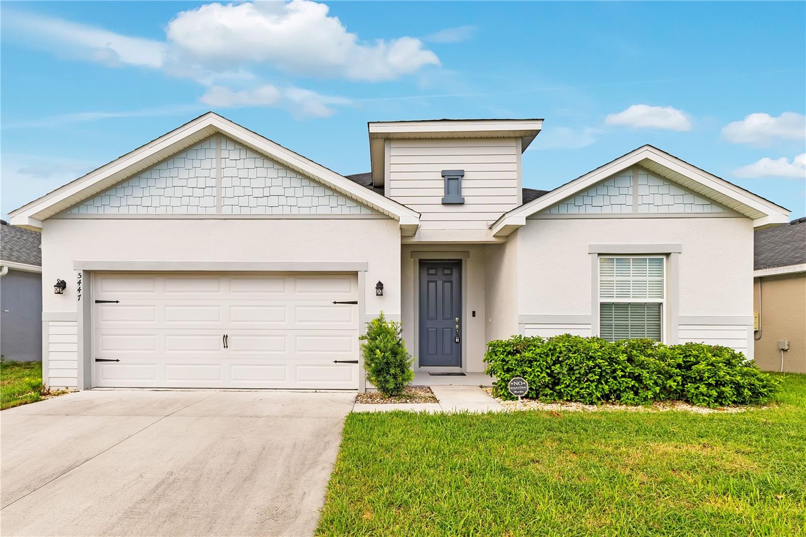 Experience the perfect blend of modern design, comfort, and functionality in this beautifully maintained 4-bedroom, 3-bathroom home in the highly desirable Siena Reserve community of Saint Cloud. Thoughtfully designed with an open-concept floor plan, this home offers the ideal balance of spacious living and everyday convenience.

A welcoming foyer leads into the expansive great room where the spacious living and dining areas flow effortlessly into the heart of the home—the stunning kitchen. Designed with both style and practicality in mind, it features quartz countertops, stainless steel appliances, white shaker cabinetry, a walk-in pantry, and an oversized center island with seating, making it the perfect space for entertaining or enjoying everyday meals. Luxury vinyl plank flooring extends throughout the main living areas, while plush carpet adds warmth and comfort to the bedrooms.

Just off the living room, elegant double doors open to the private primary suite, creating a peaceful retreat complete with a tray ceiling, spacious walk-in closet, and an ensuite bathroom featuring dual vanities and a large walk-in shower. The remaining bedrooms are generously sized with similar layouts, offering plenty of natural light and flexibility for family, guests, or a home office. Two of the bedrooms are connected by a convenient Jack-and-Jill bathroom, providing both functionality and privacy.

Sliding glass doors lead to the covered, screened lanai, providing the perfect place to relax year-round while overlooking the fully vinyl-fenced backyard with plenty of room for pets, play, gardening, or future outdoor living additions.

Conveniently located near shopping, dining, schools, Lake Nona, Medical City, Orlando International Airport, and major highways, this home offers easy access to everything Central Florida has to offer. Residents enjoy access to a community clubhouse, swimming pool, and more!

This exceptional home combines a functional layout, stylish finishes, and an unbeatable location, making it an opportunity you won't want to miss.