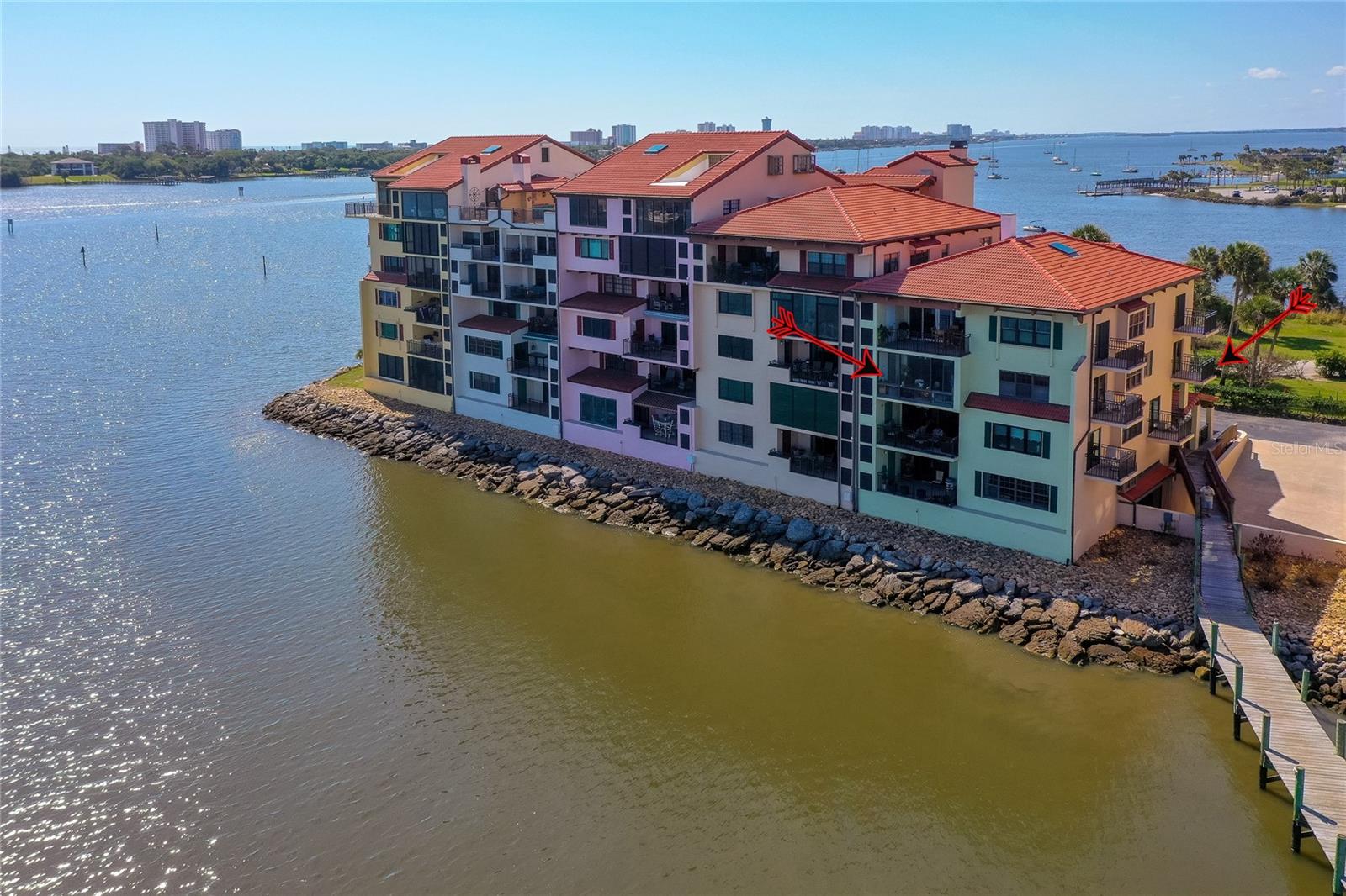 Experience waterfront living at its finest in this stunning 3-bedroom, 2-bath end-unit residence in secure Marina Point. Perfectly positioned directly on the Intracoastal Waterway, this exceptional condo offers breathtaking panoramic views of the river, marinas, Marina Point boat slips, and the iconic Veterans Memorial Bridge — beautifully illuminated in orange each evening. By day, enjoy endless scenery of dolphins, manatees, seabirds, yachts, and passing boats; by night, the sparkling city lights and reflections create an unforgettable backdrop. Designed to maximize the spectacular water views, the open floor plan features a spacious living area, wet bar, sunroom that feels like you’re aboard a luxury cruise ship, and two private balconies — one off the primary suite and another from a guest bedroom. The large kitchen offers Intracoastal views from the breakfast area, along with a pantry featuring pull-out shelving and a beverage cooler for effortless entertaining. Additional highlights include two side-by-side secure underground parking spaces with a storage cabinet, bicycle storage, ample guest parking, car wash area, and dog park. Residents enjoy a riverfront clubhouse and pool in this gated marina community. Boating enthusiasts will appreciate the availability of deep-water boat slips ($500 annually for boats up to 30 feet and $1,000 annually for larger boats, when available, with waiting list options). Ideally located near the revitalized downtown Daytona Beach riverfront, you can walk to the Chart House, Yacht Club, restaurants, museums, art galleries, shops, and the multi-million-dollar Riverfront Esplanade. Just minutes from the beach, Daytona International Speedway, Daytona International Airport, and Pictona’s world-class pickleball complex, with easy access to Orlando, Jacksonville, Tampa, St. Augustine, the Space Coast, and beyond. Recent building improvements include resurfaced balconies, new balcony railings, new tile roof, concrete restoration, new walkways, exterior painting, and plumbing upgrades — offering peace of mind and exceptional value. 3 – months minimum rental.