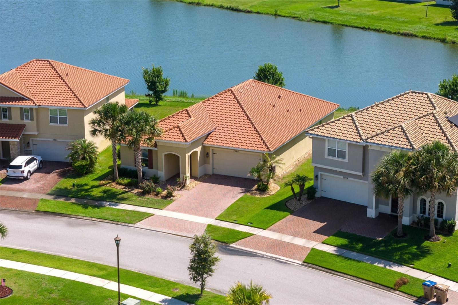 Virtually Staged. Lakefront Living on Lake Toho | Seller Offering $3,000 Toward Closing Costs!

Welcome to 3906 Carrick Bend Drive, a beautifully maintained 4-bedroom, 2-bathroom lakefront home with direct shoreline access to Lake Tohopekaliga (Lake Toho), Osceola County's largest lake, and the seller is offering $3,000 toward closing costs with an acceptable offer, making this lakefront lifestyle even more attainable. Set in the highly sought-after gated resort community of Bellalago, this 2,100+ square foot residence offers an open-concept floor plan, abundant natural light, upgraded lighting fixtures, and interior doors throughout all framed by serene, unobstructed water views right from your backyard.

Step outside and you're on Lake Toho's shoreline, with easy access to world-renowned bass fishing, kayaking, paddle boarding, and birdwatching just steps from home. Nearby Lakefront Park adds scenic walking paths and waterfront views along Lakeshore Boulevard, extending your lake access even further. Beyond the water, Bellalago delivers true resort-style living: multiple community pools, a state-of-the-art fitness center, tennis and basketball courts, on-site lakeside dining, miles of lakeside walking and biking trails, 24-hour gated security, and a full calendar of community events. Conveniently located near shopping, dining, top-rated schools, and Central Florida's world-famous attractions, this home blends true lakefront living with everyday convenience.
Don't miss this rare opportunity to own a piece of Lake Toho with $3,000 in seller-paid closing costs to help get you there. Schedule your private showing today!