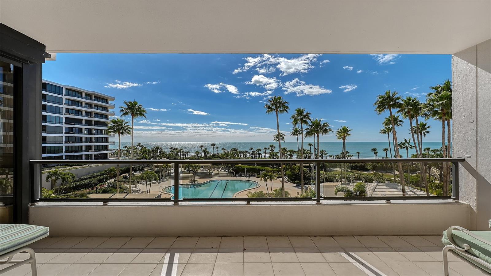 The Sanctuary behind the gates of the Longboat Key Club located on the beachfront is one of the most
desirable addresses on Longboat Key, Florida. New to the market, this full on, direct Gulf view residence B305
in Building III at 545 Sanctuary Drive offers about 3,000 square feet with three bedrooms & 2 ½ bathrooms 
providing spacious and elegant beach front living.  From the handsome double door entry, the gleaming marble
floor dining area invites you into this luxurious condominium home. Then, you will be treated to a sparkling like
diamonds daytime Gulf water views or in the evening, breathtaking sunsets in shades of purple & orange.
These magnificent direct Gulf views can be enjoyed from the attractively furnished living room and the serene
primary bedroom & of course from the 21-foot-long covered Gulf side terrace.  This unique Carlyle floorplan also
features a second, east facing private terrace which can be accessed through the guest bedroom as well as from
the handsome kitchen as you enjoy morning sunrises with a cup of coffee.
This beach retreat is in impeccable condition with high quality furnishings plus electric storm shutters on all sliding
doors.  This unit also has one under building garage space #150 plus a climate controlled storage cage.
Decorated in neutral tones, this home offers coastal elegant style throughout.  The cozy eat in kitchen has custom built light
wood cabinetry, high end finishes, cream colored granite counter tops, tile backsplash & double ovens.  The gracious, large 
primary bedroom suite is a tranquil retreat with Gulf water views, a large walk-in closet & a spa like En Suite bathroom with
double sinks, a soaking tub & a walk-in shower.  
The Sanctuary offers an exclusive resort lifestyle.  The beautiful beach front measures 1200 feet of pristine white sand. The resort 
style, heated Olympic sized swimming pool includes a 25 meter lap lane plus there is a separate outdoor whirlpool & fire pit area.
Amenities include two lighted Har-Tru tennis courts & a state of the art fitness center with saunas located in the newly redecorated 
clubhouse which offers a fully equipped kitchen & entertainment room. On site management, 24 hour security & 18 acres of
meticulously maintained grounds & beach enhance the sense of exclusivity & security.