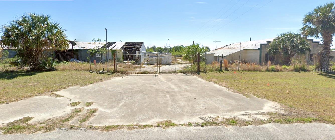 Under contract-accepting backup offers. This 23.6 acre lot is in the heart of the fast expanding industrial district in Apopka, Florida. Neighbors include Amazon, Coca Cola, Goya Foods, CoPart and many warehouses and distribution centers. It is located near major arteries 441, 451, 429 which are the fast tracks to anywhere in Central Florida and beyond. A Medical Marijuana grow zone information, survey and Phase I and II environmental studies are available. The buildings are tear downs as the value is in the land. Call, text or email today to schedule a showing or inquire.
