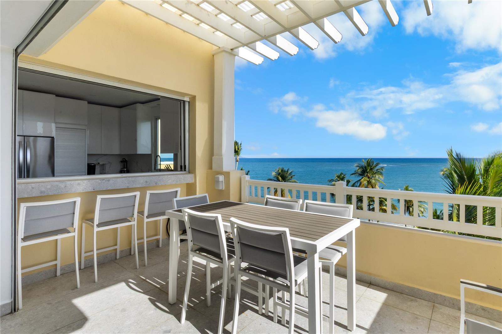 Experience elevated coastal living in this stunning corner penthouse at The Marbella Club, an exclusive beachfront community within Palmas del Mar, Puerto Rico. Designed for comfort, privacy, and style, this beautifully remodeled residence offers 4 spacious bedrooms and 4 full bathrooms, all thoughtfully finished with modern, timeless details.

High ceilings and expansive living areas are filled with natural light, creating a bright and welcoming atmosphere throughout. As a corner unit, the residence enjoys enhanced privacy, cross-ventilation, and sweeping ocean views that set the tone for relaxed beachfront living. The open layout seamlessly connects indoor spaces, while direct beach access places the shoreline just steps from your door. Featuring approximately 2,650sqft of living space and two assigned underground parkings. 

The Marbella Club is a gated community known for its well-appointed amenities, including two resort-style pools, a jacuzzi, a fully equipped fitness center, wine cellar, elevators, and full power generator, offering both comfort and peace of mind.

Located within the world-class Palmas del Mar Resort, residents enjoy access to championship golf courses, tennis courts, equestrian trails, marina, restaurants, beach club, walking paths, and The Palmas Academy, making this an ideal setting for full-time living or a luxury second home.

This penthouse presents a rare opportunity to own a refined beachfront residence in one of Puerto Rico’s most sought-after resort communities.

Palmas del Mar HOA: $1,300/year
Marbella HOA: $1,138/m
Insurance: $7,477.22
Property taxes: $3,187/year